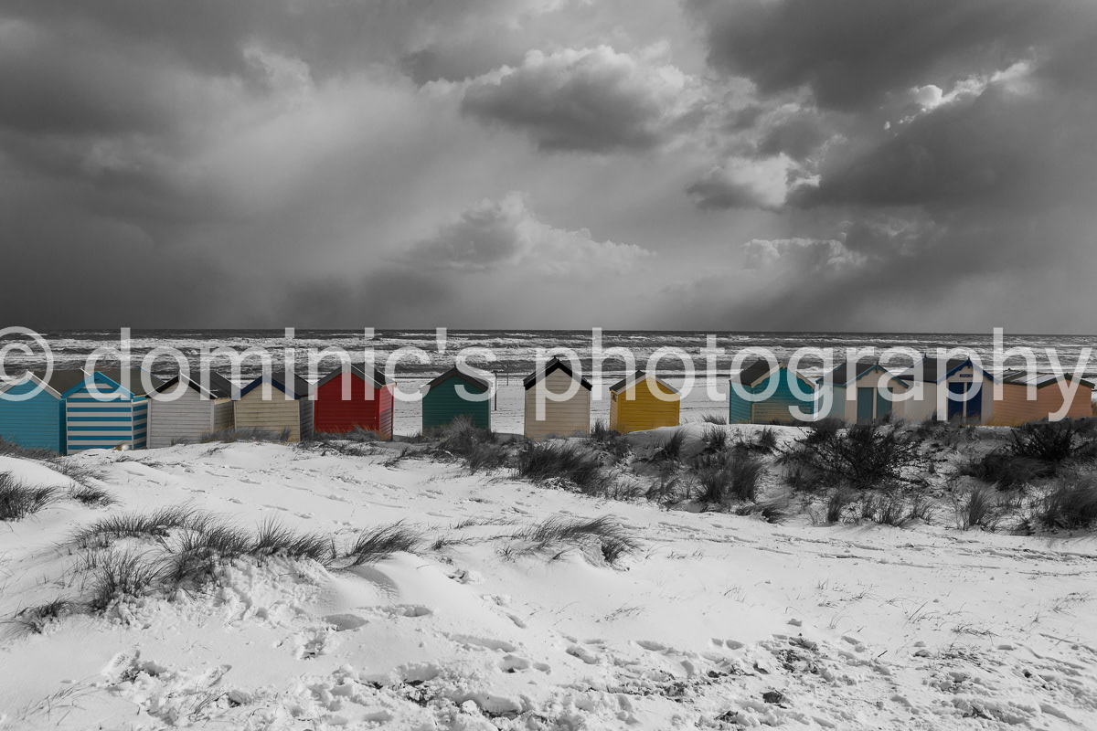 beach huts snow spot