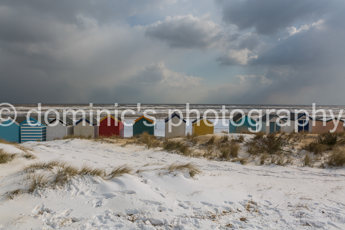 beach huts snow