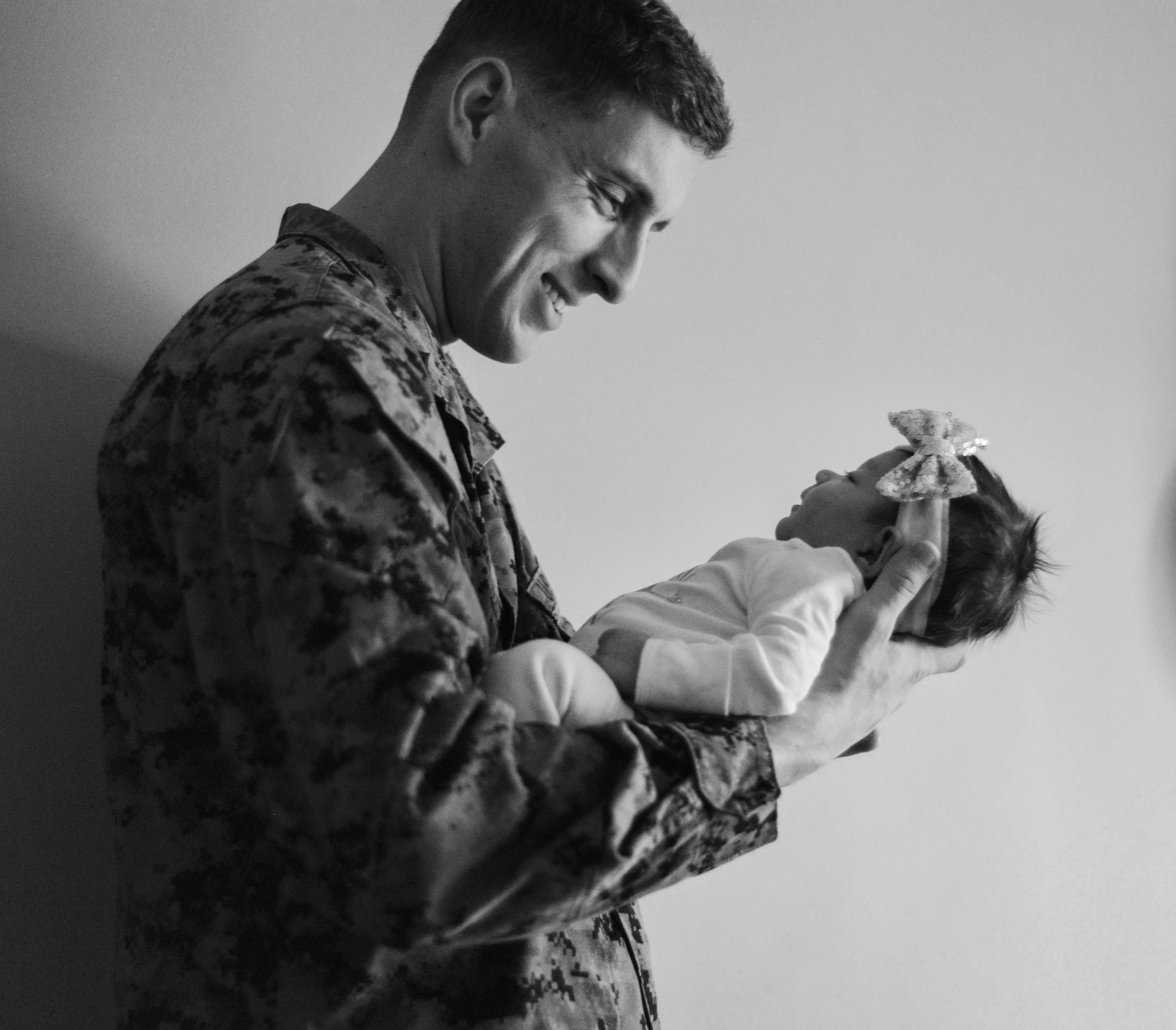 Daddy and daughter enjoy each other's company, lifestyle photography shoot New Bern, NC 2020