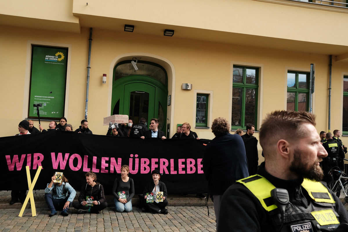The Green Party central office is blocked in protest.