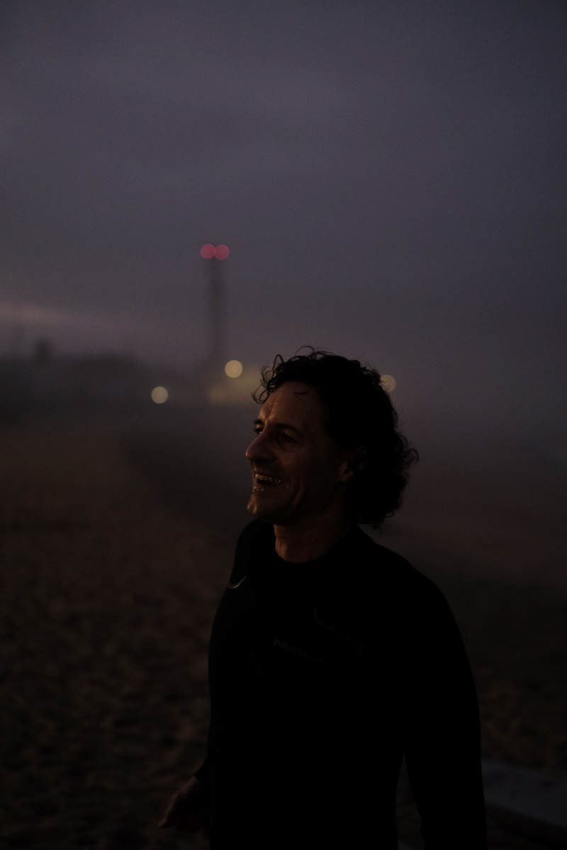 Alexander, founder of Langbrett, out for an early morning surf.  Espinho, Portugal, October 2021