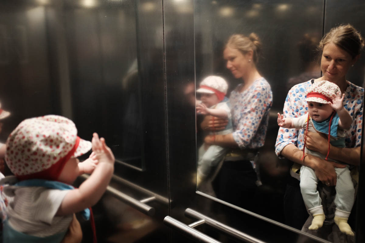 Our daughter, Juli, sees her reflection in an elevator. Berlin, August 2021