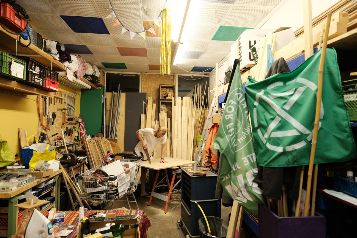 An activist working in the Extinction Rebellion workshop prior to the "Autumn Rebellion".