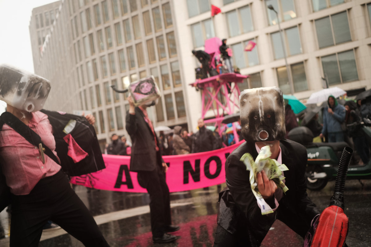 Activists visualise societies greed and addiction to fossil fuels.