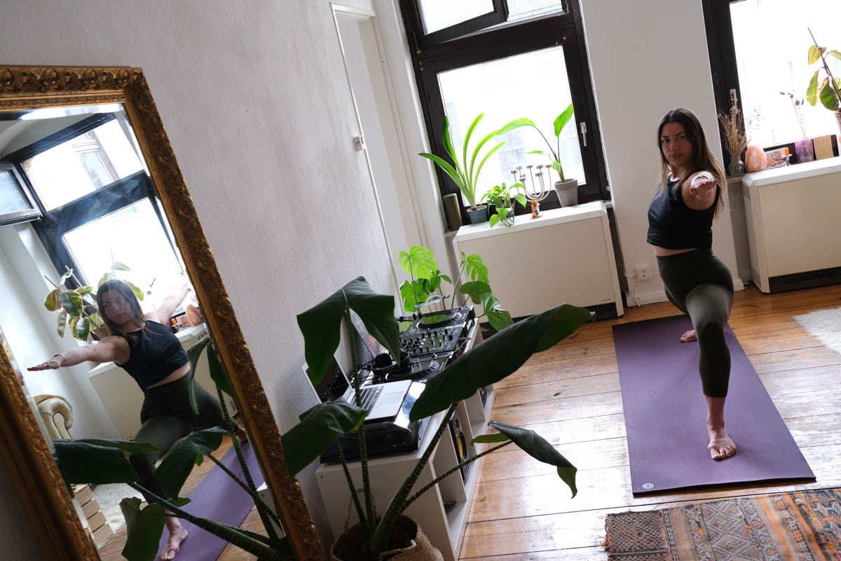 Delphine Hazledine practices yoga. Berlin, March 2021