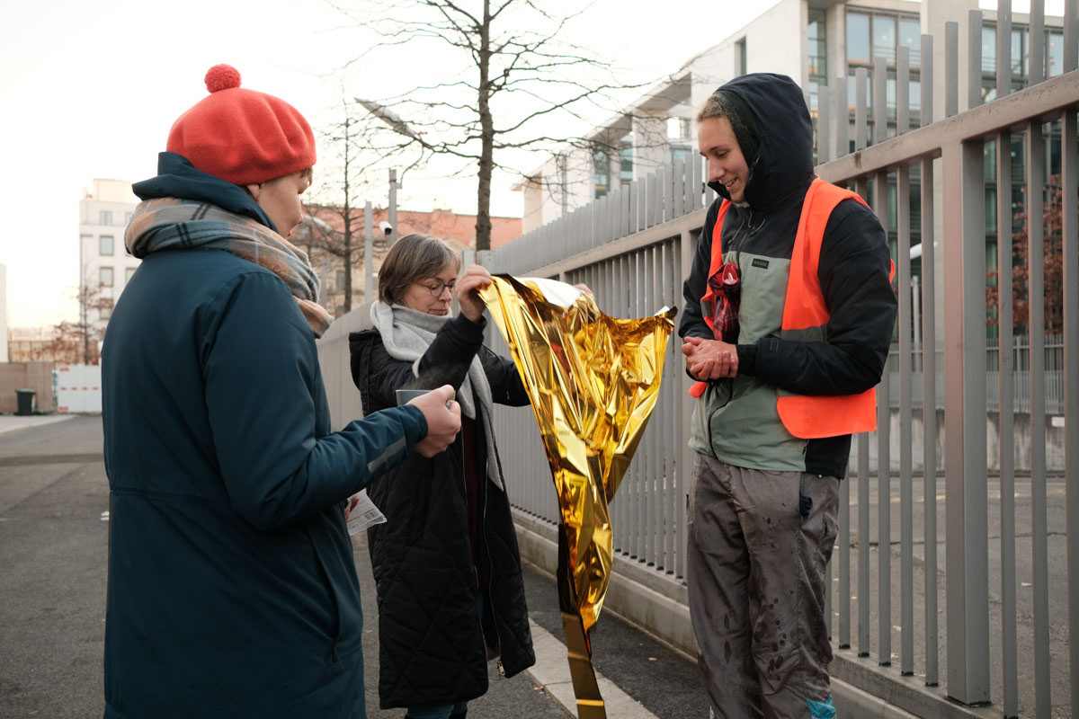 -8 Celcius and office workers offer tea and a hot water bottle to activists