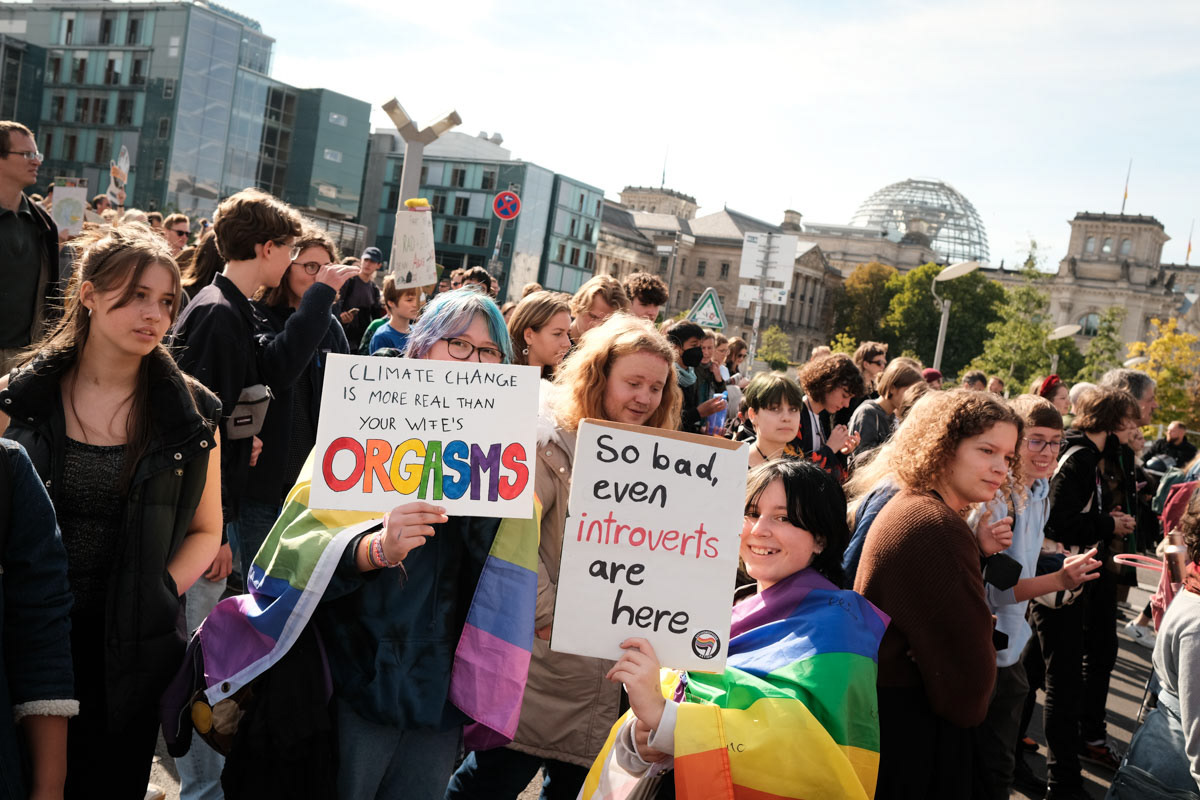 Protesters don't lack humour: "Climate change is more real than your wife's orgasms".