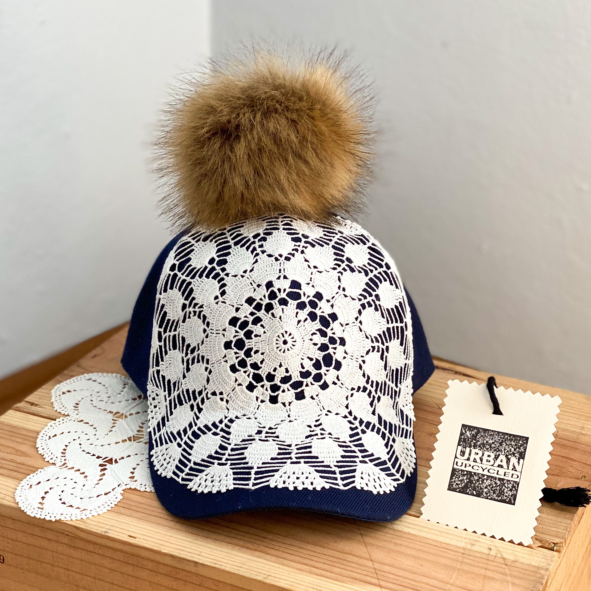 Urban Upcycled Kind Hearted Sustainable Fashion and Lifestyle | Navy Baseball Cap with Vintage Doily of 80s and Faux Fur Pom Pom 