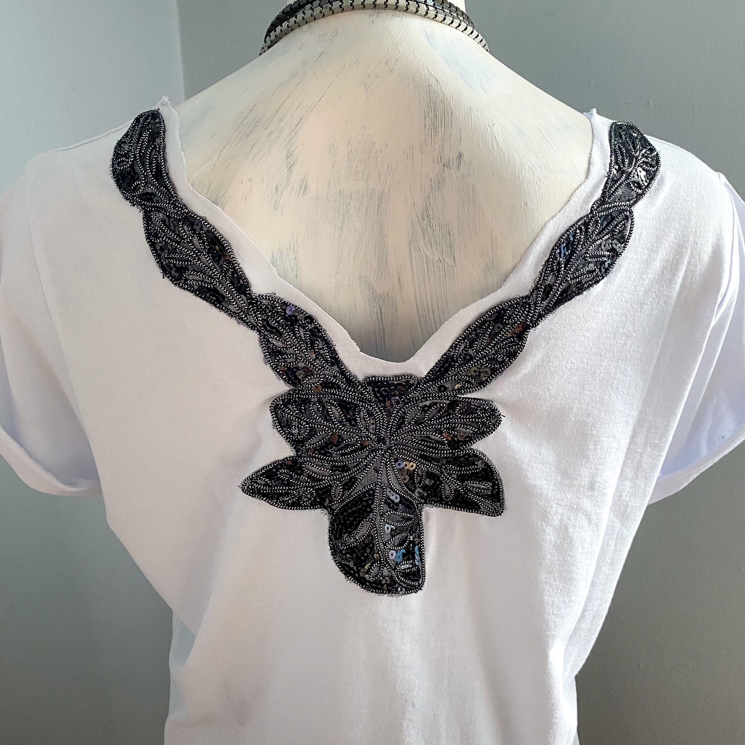 Urban Upcycled Kind Hearted Sustainable Fashion and Lifestyle | White T-Shirt With V-Back Black Sequin
