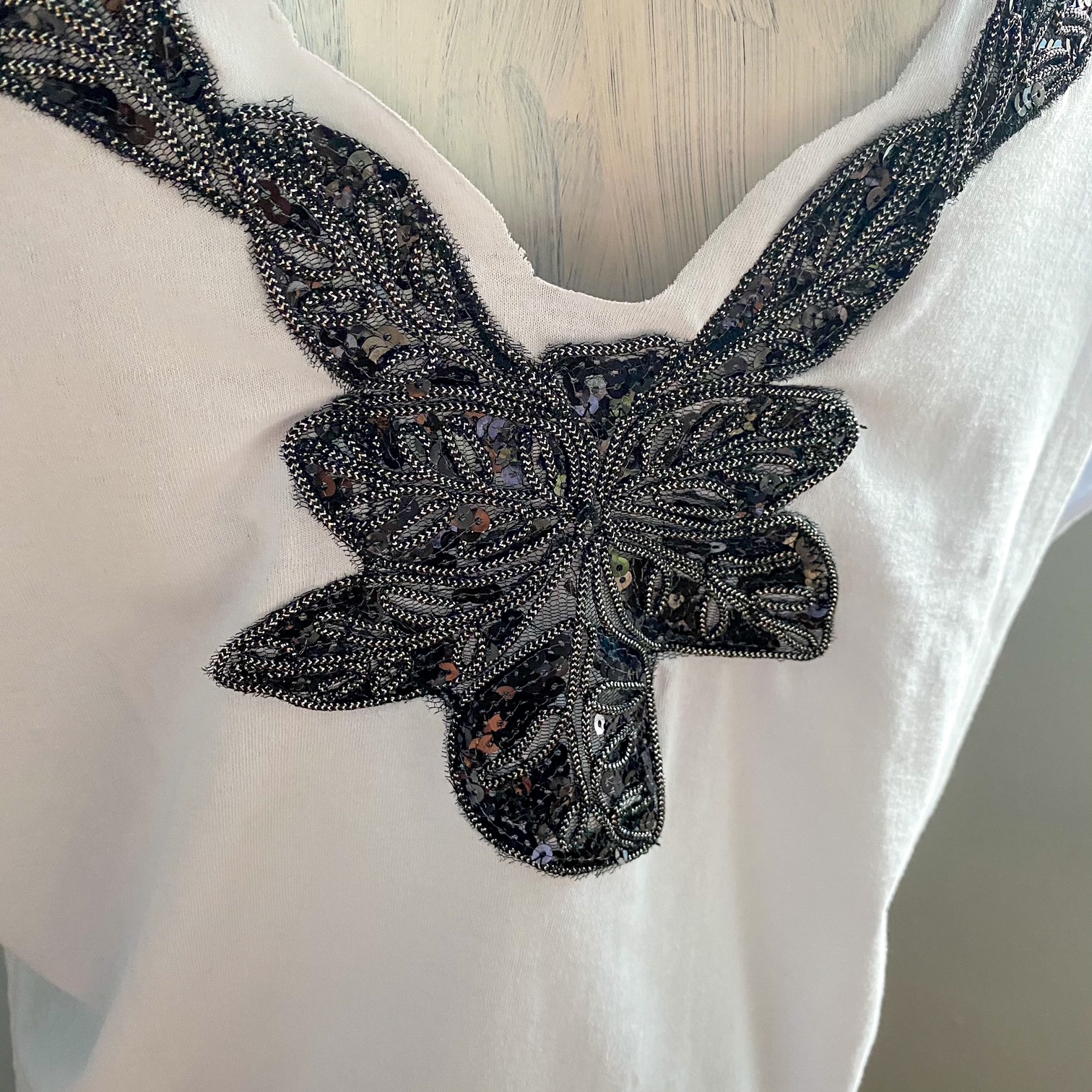 Urban Upcycled Kind Hearted Sustainable Fashion and Lifestyle | White T-Shirt With V-Back Black Sequin