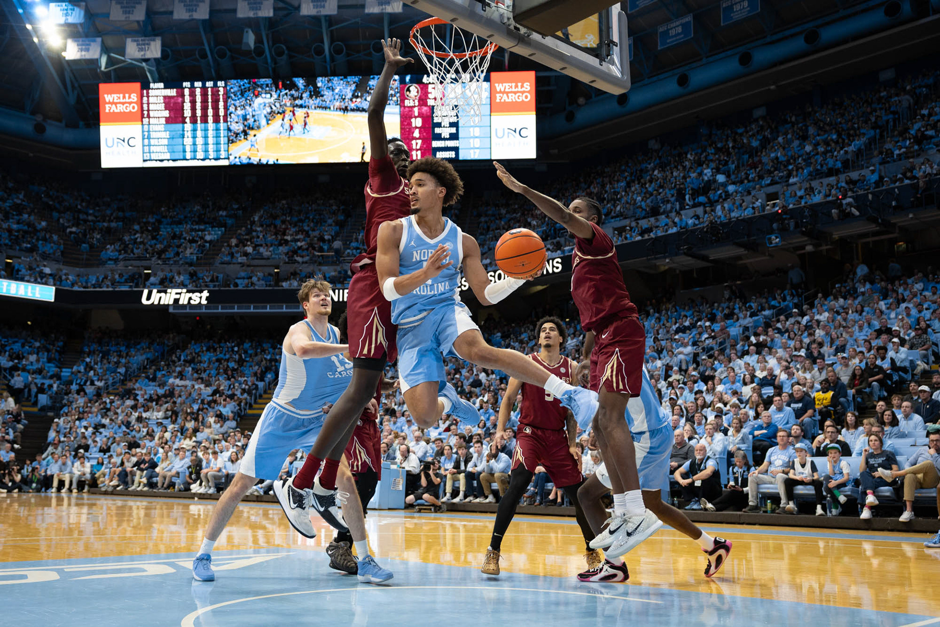 UNC senior guard Seth Trimble (7) rebounds the ball during the game against FSU at the Dean E. Smith Center on Tuesday, Dec. 30, 2025. UNC won 79-66.