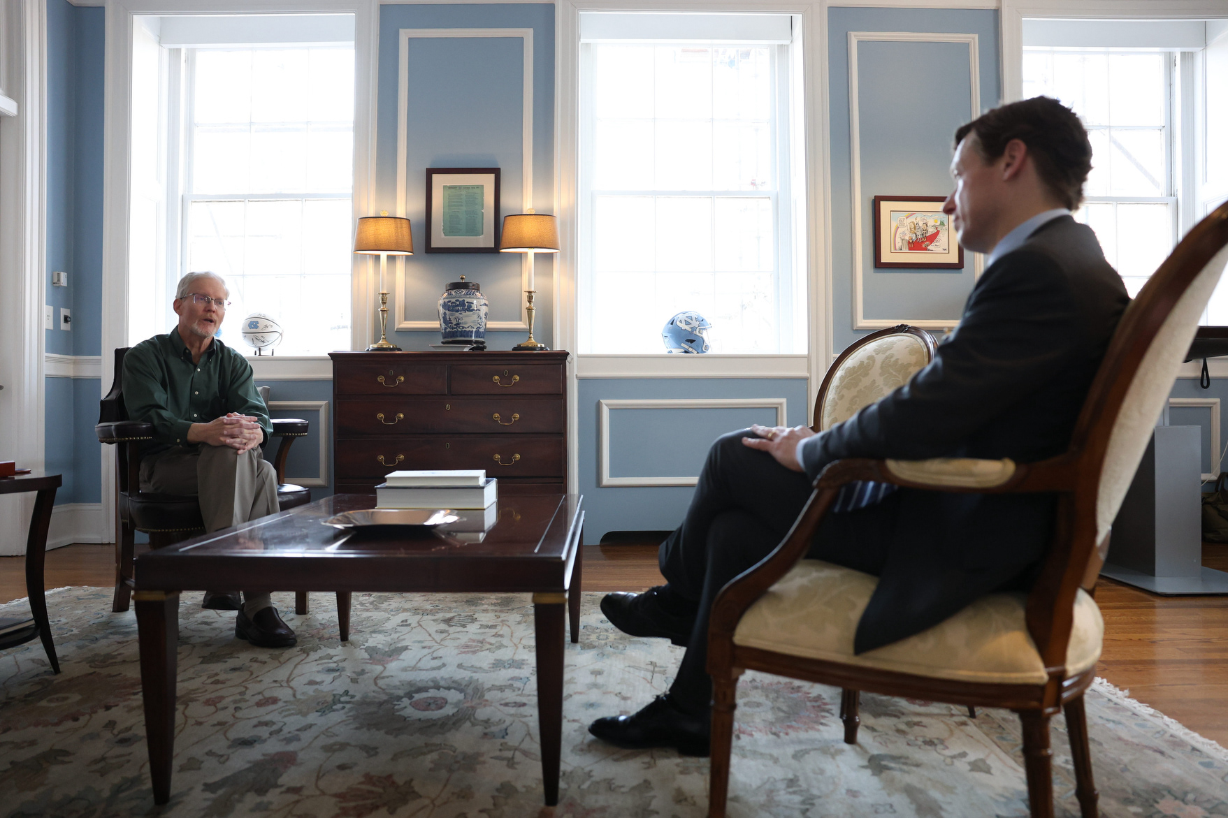 UNC Chancellor Lee Roberts meets with Rob Lewis, an alumnus from the Class of 1986, in his office at South Building on Wednesday, March 4, 2026. The two met for a brief meeting discussing art and the future of the Dean E. Smith Center.