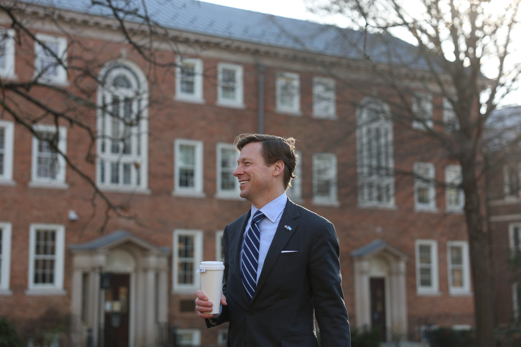 CHAPEL HILL, N.C. — UNC Chancellor Lee Roberts stops outside of South Building on Wednesday, March 4, 2026. He had stopped briefly in the morning to speak with a student on the wall by the steps.