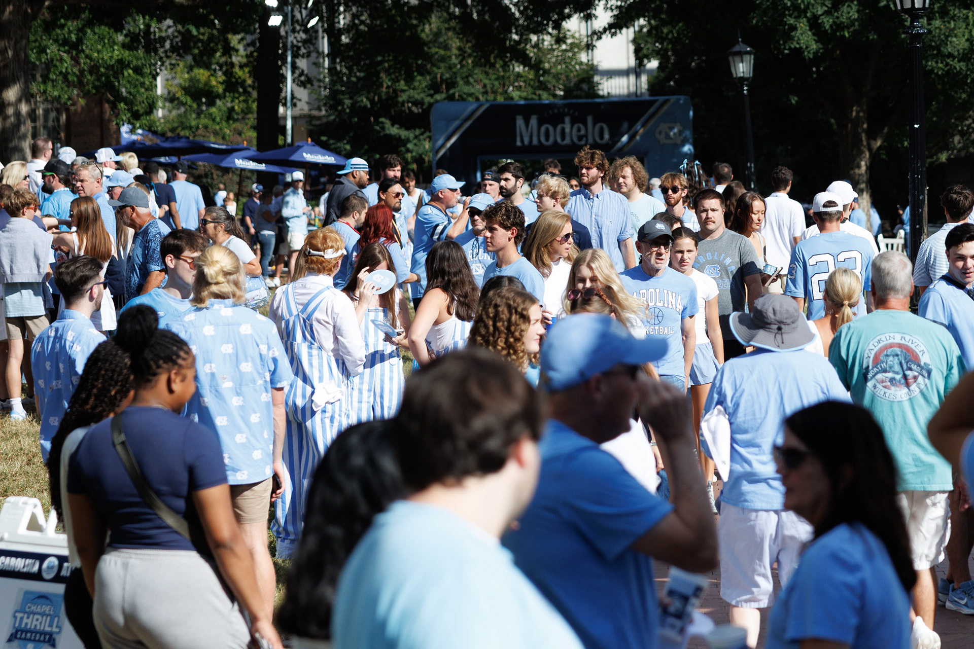 People walk through Polk Place during the Chapel Thrill pre-game events prior to the UNC football game against TCU on Monday, Sept. 1, 2025.