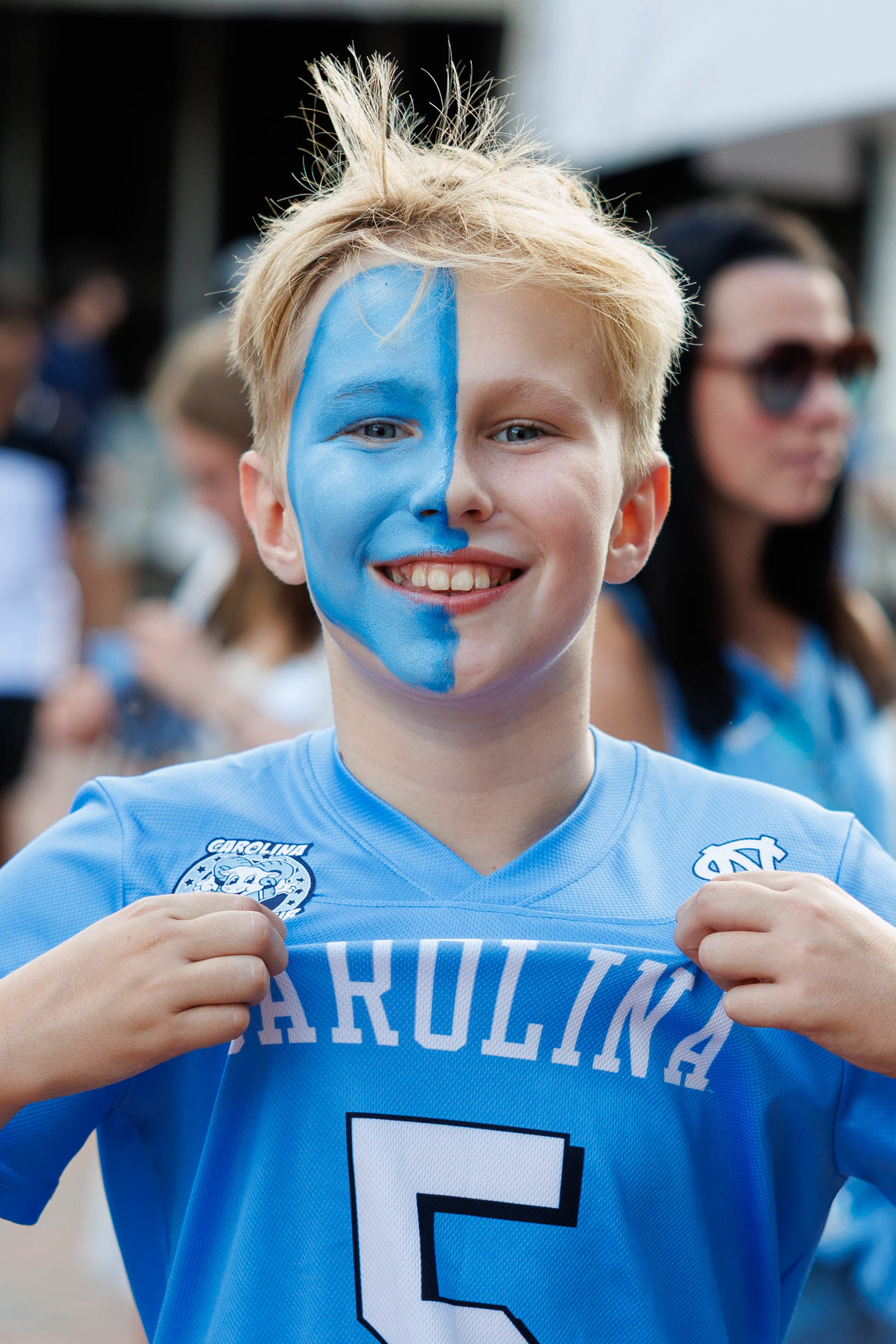 A fan poses for a portrait after having his face painted during the Chapel Thrill pre-game events prior to the UNC football game against TCU on Monday, Sept. 1, 2025.