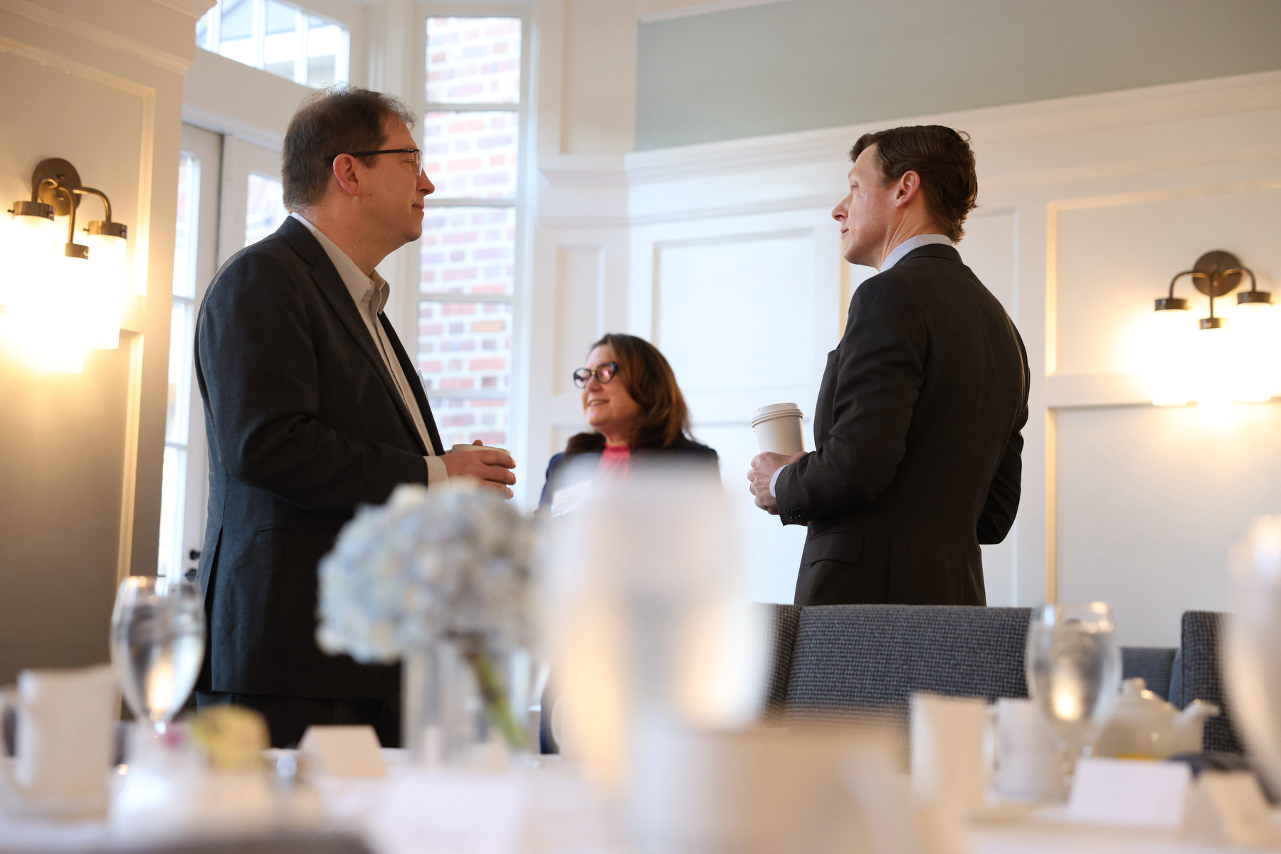 UNC Chancellor Lee Roberts speaks with Vice Provost for AI Jeffrey Bardzell at the Carolina Inn on Wednesday, March 4, 2026. Roberts’ visit was brief, as he had spent the time mostly socializing with CEOs and university officials, including new Provost Magnus Egerstedt, involved with the meeting.