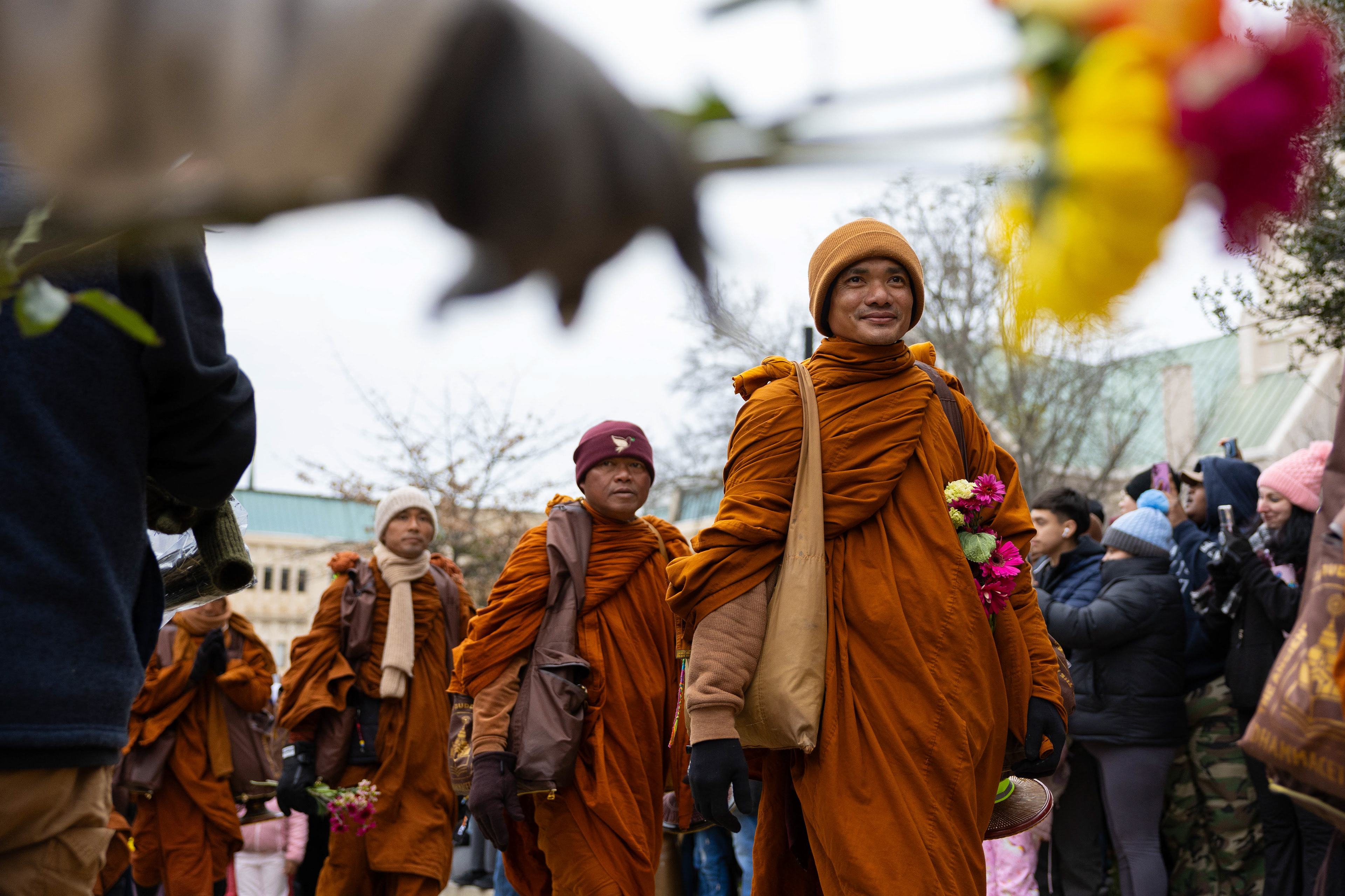 RALEIGH, N.C. — Buddhist monks participating in the “Walk for Peace” walk by spectators at the State Capitol in Raleigh on Saturday, Jan. 24, 2026.