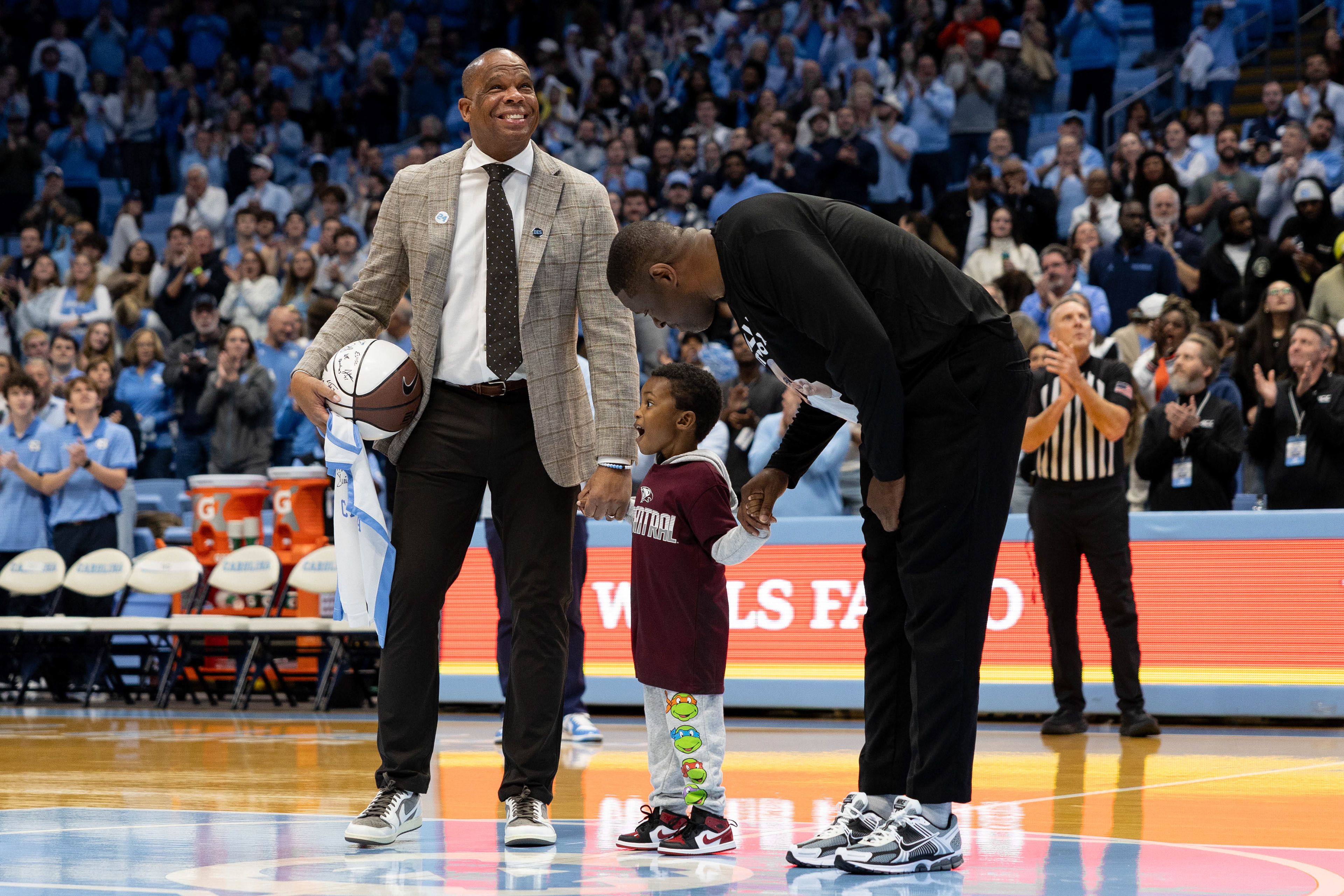 UNC head coach Hubert Davis and NC Central head coach LeVelle Motion walk out onto the court prior to the men's basketball game against NC Central on Friday, Nov. 14, 2025 at the Dean Smith Center.