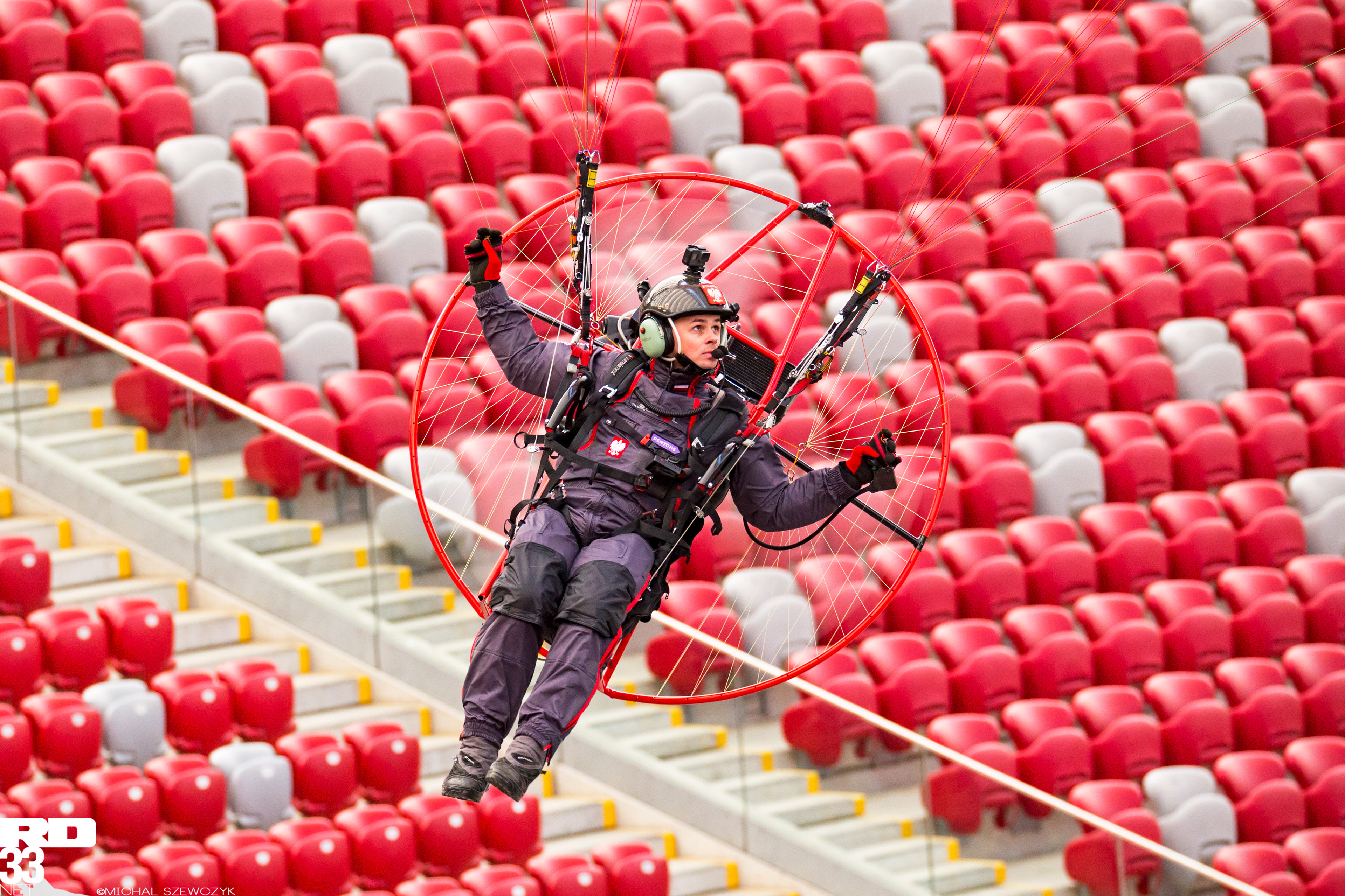 Pawel Lojak Kozarzewski flying inside PGE Narodowy Stadium, Warsaw, Poland.