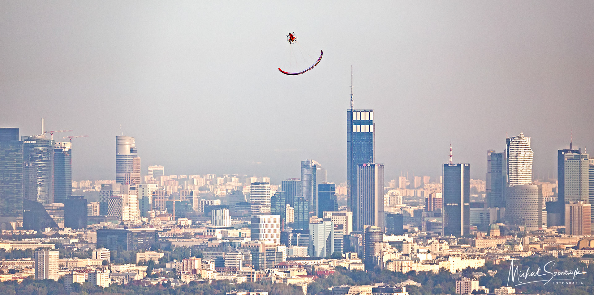 Lojak over Wilanów with a Warsaw in the background