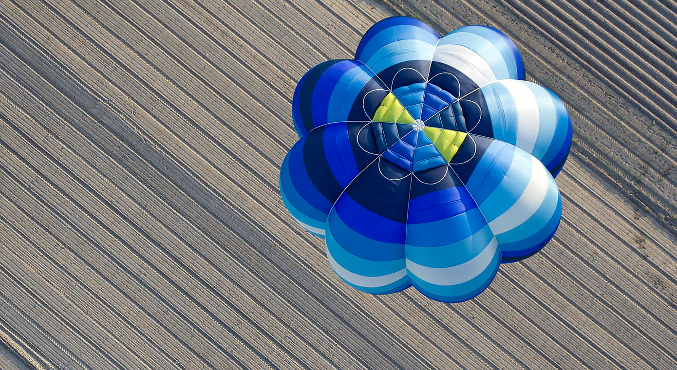 Hot air balloon over the field. Modlin, Poland.