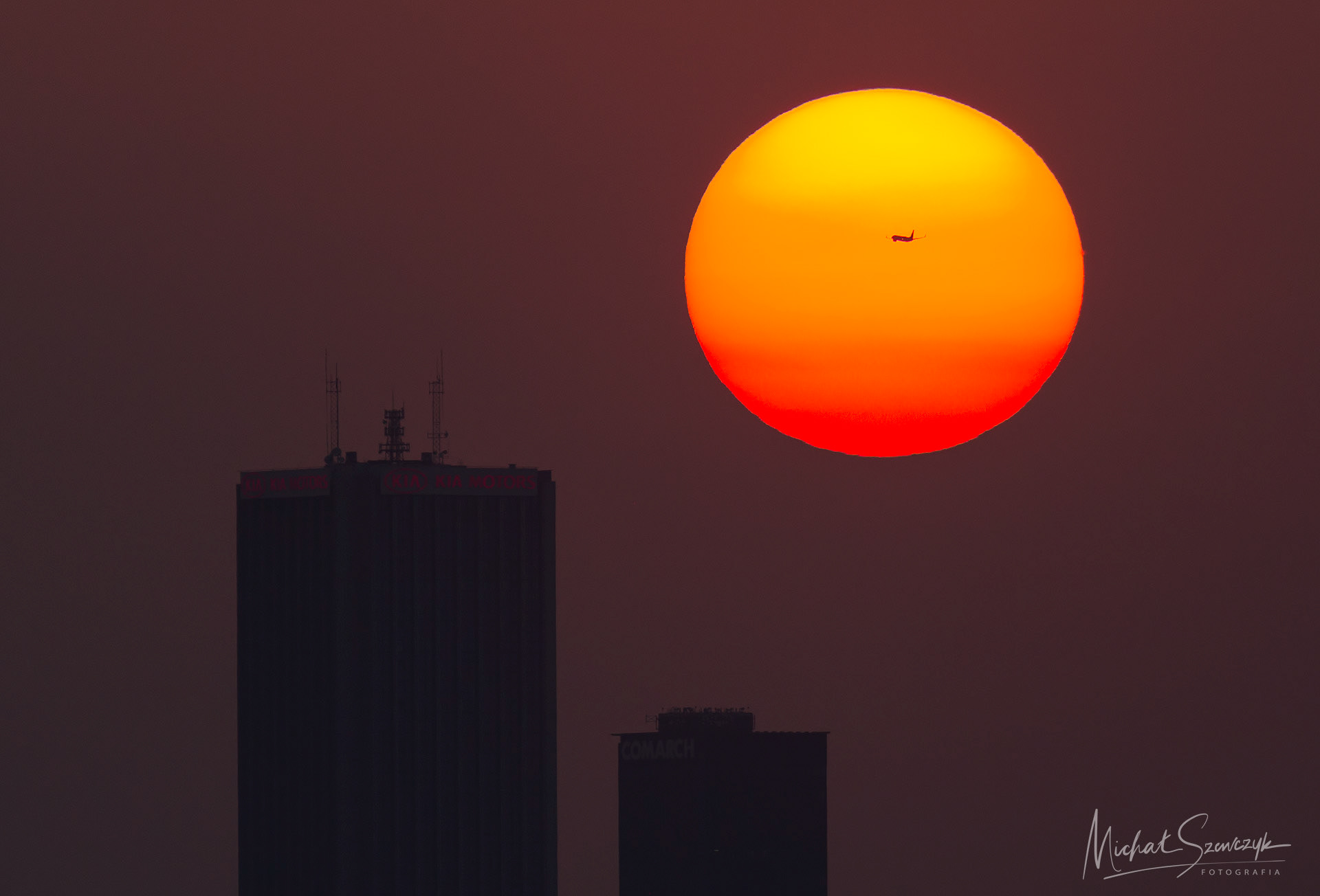 A plane on the sun. Warsaw.