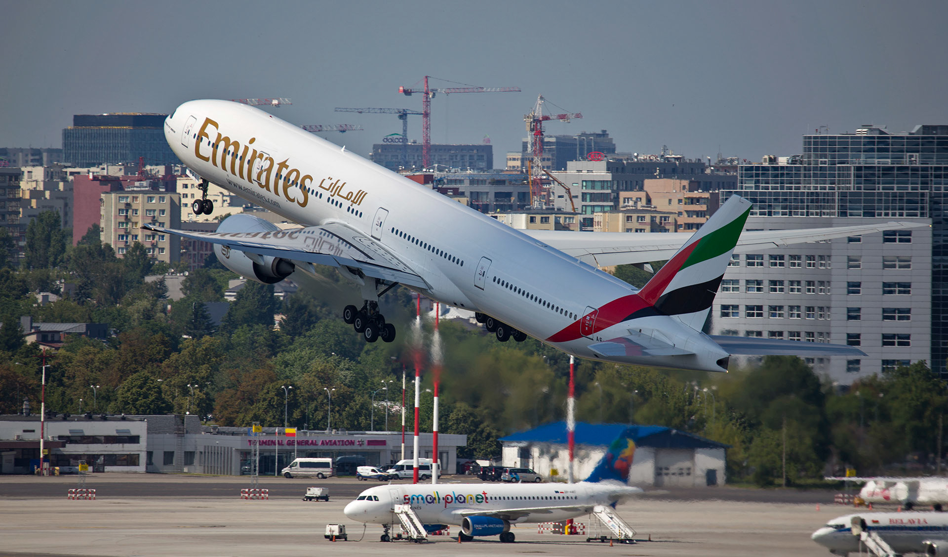 Emirates B777 departing from Warsaw, Poland.