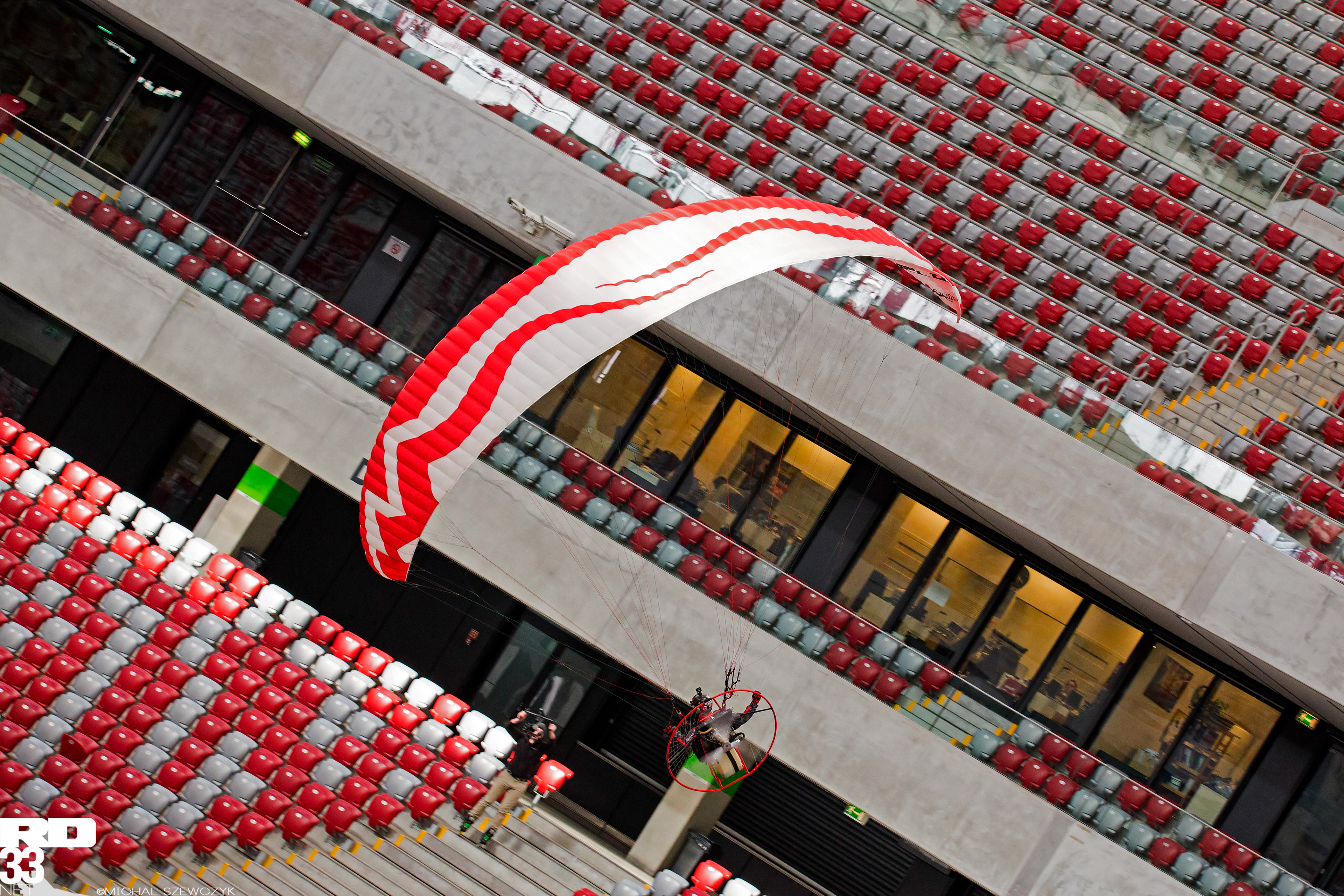 Pawel Lojak Kozarzewski flying inside PGE Narodowy Stadium, Warsaw, Poland.