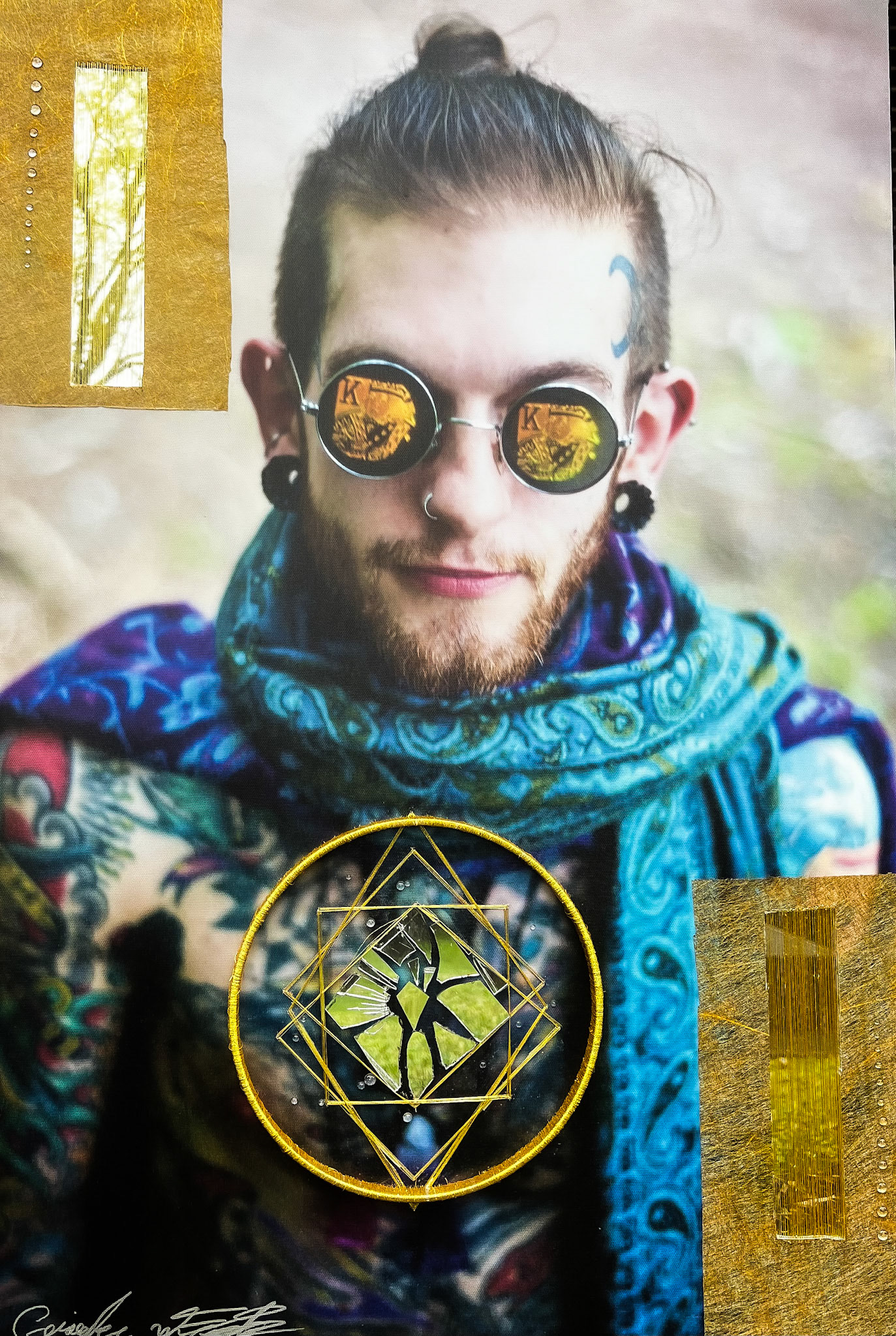 King of Diamonds $3000 30x20x1 (2024) Multimedia A Person stands looking up with playing cards reflected in their glasses. The image is further deepened with layers of mirror and thread inviting the viewer to look for their own reflection hidden within the art.