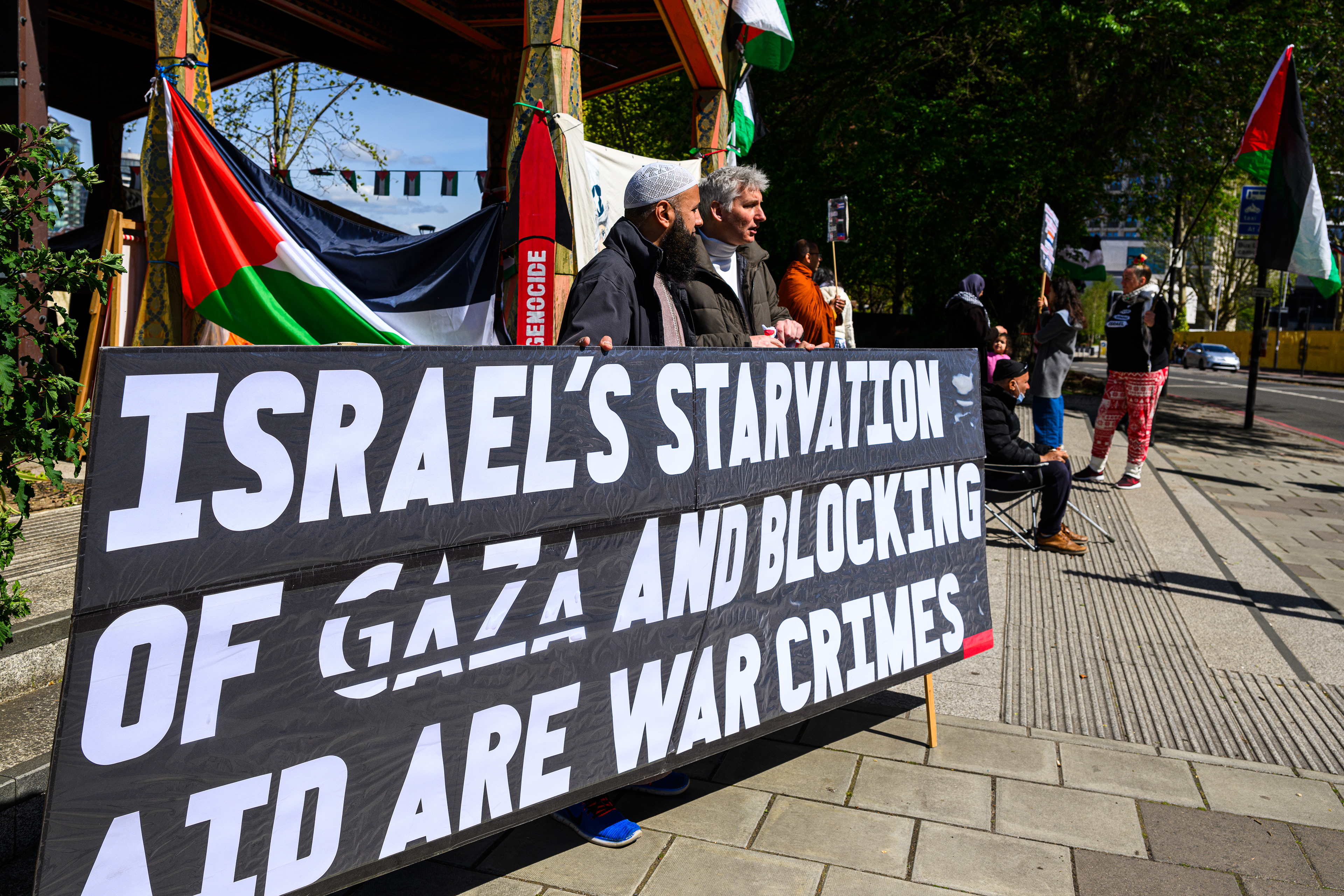 People visit the camp everyday to show support. Most bring signs and Palestine flags but some bring food and gifts.