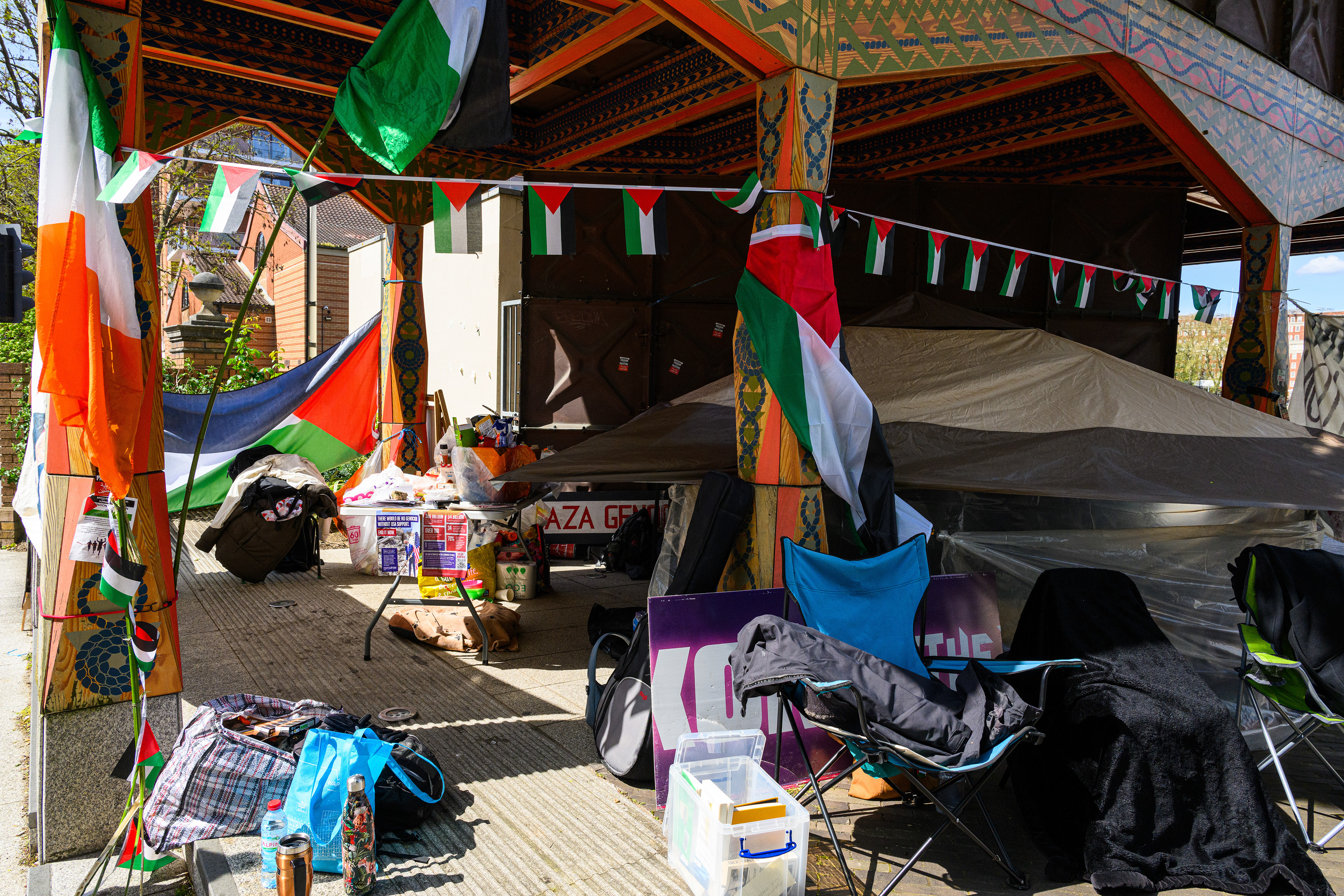The camp is established under an exisiting overhanding roof. It affords the campers some protection against the elements, but it also doubles as a great place to hang flags and bunting.