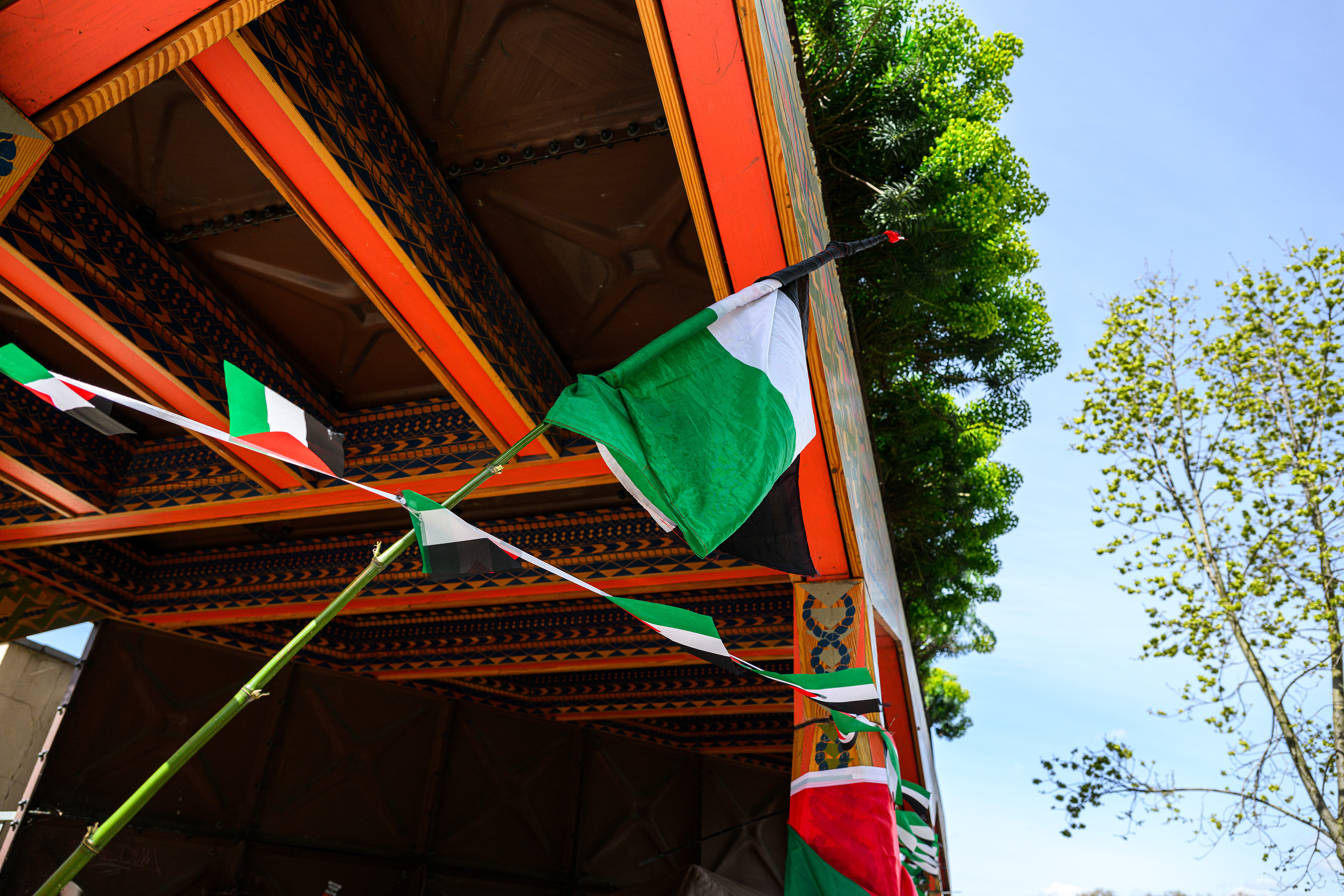 The camp is established under an exisiting overhanding roof. It affords the campers some protection against the elements, but it also doubles as a great place to hang flags and bunting.