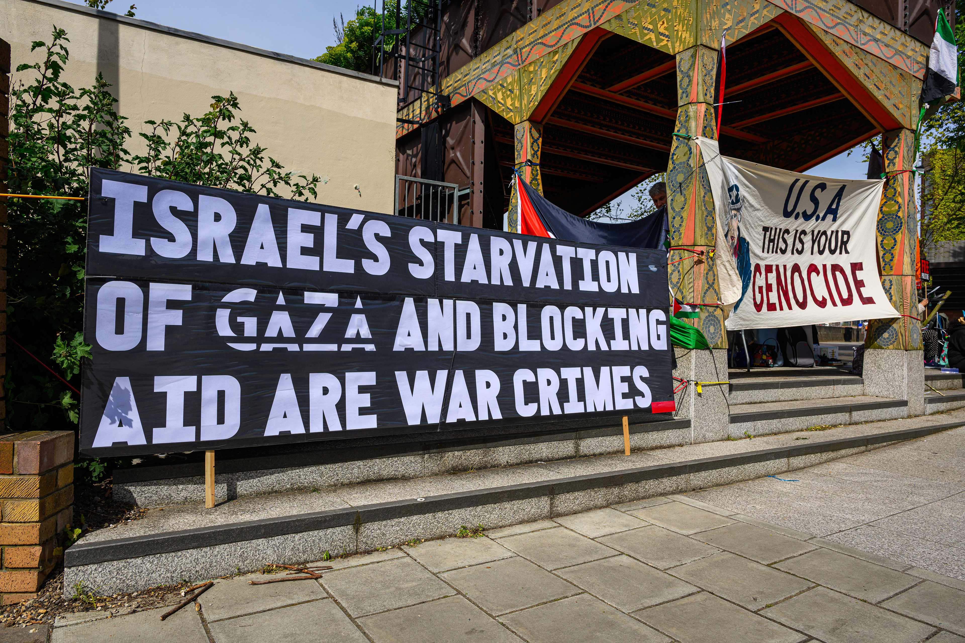 The protest camp is adorned with banners, posters and flags that convey the protesters beliefs surrounding the ongoing Israel/Palestine conflict