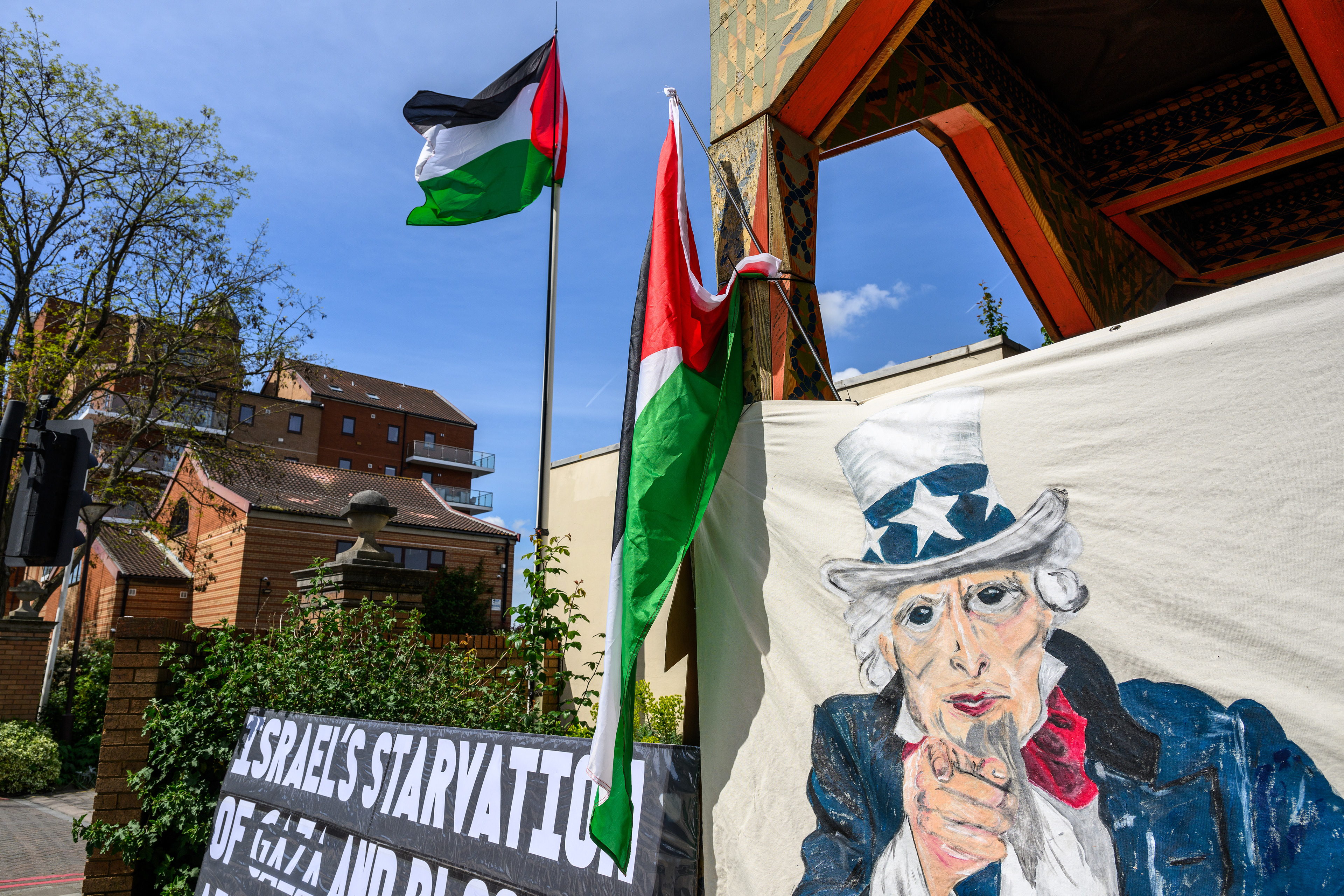 The protest camp is adorned with banners, posters and flags that convey the protesters beliefs surrounding the ongoing Israel/Palestine conflict