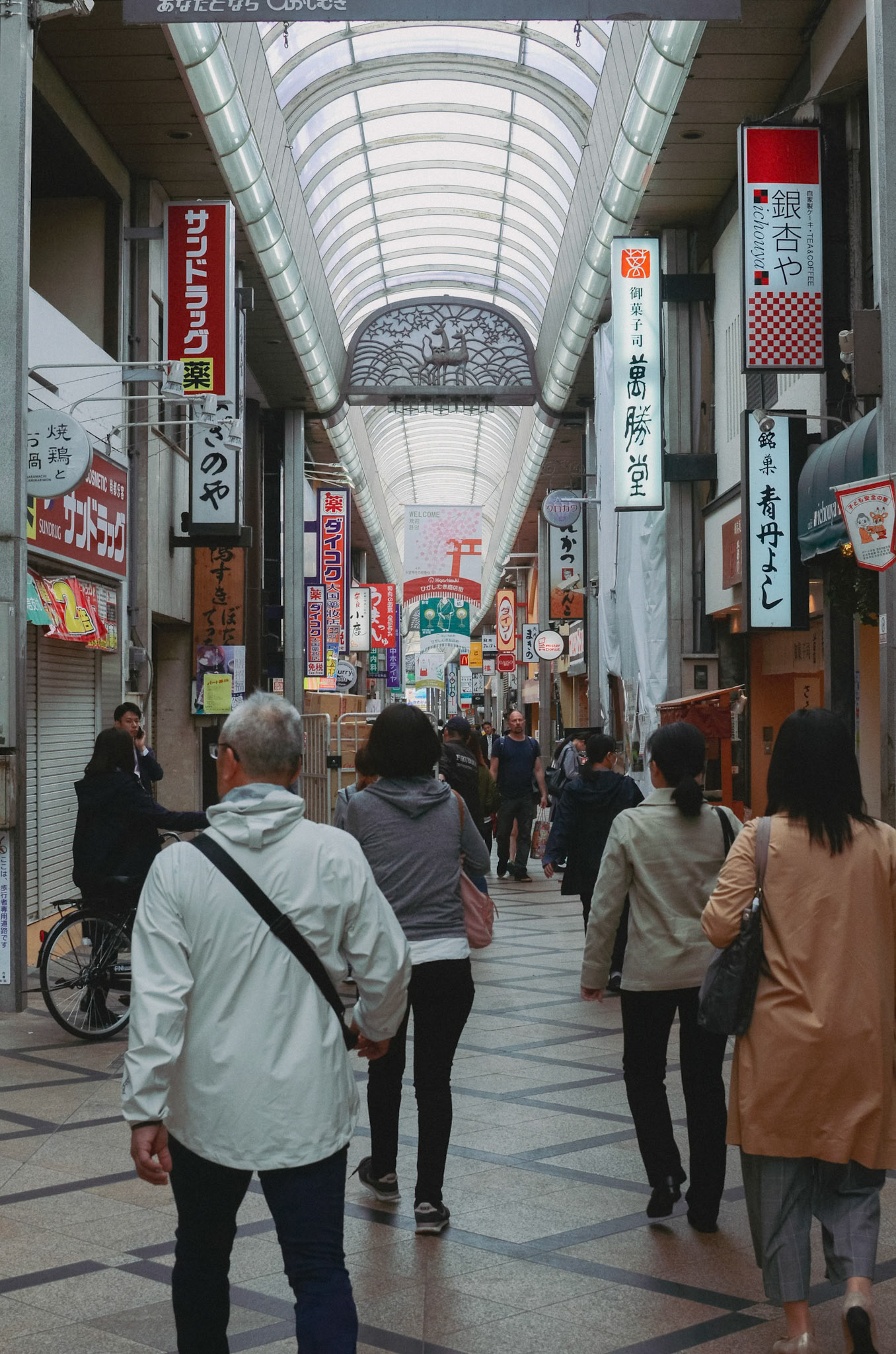 Higashimuki Shopping Street, Nara, Japan  Early morning breakfast hunting at Higashimuki Shopping Street. Most shops are still closed, and locals are busy opening up for the day. There’s something so peaceful about Nara before the crowds arrive (plus, the deer are less aggressive in the early morning!)”