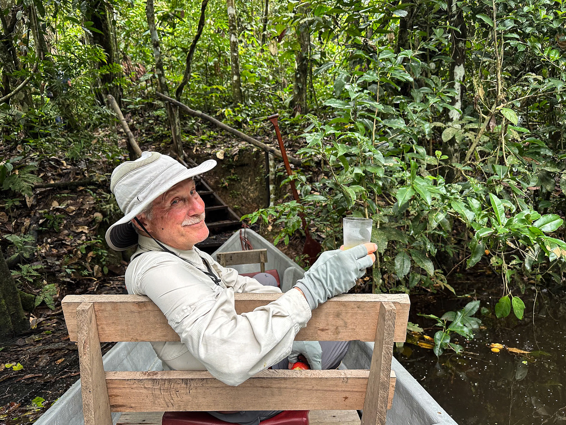 Safely out of the forest with cool beverage provided by our guides.
