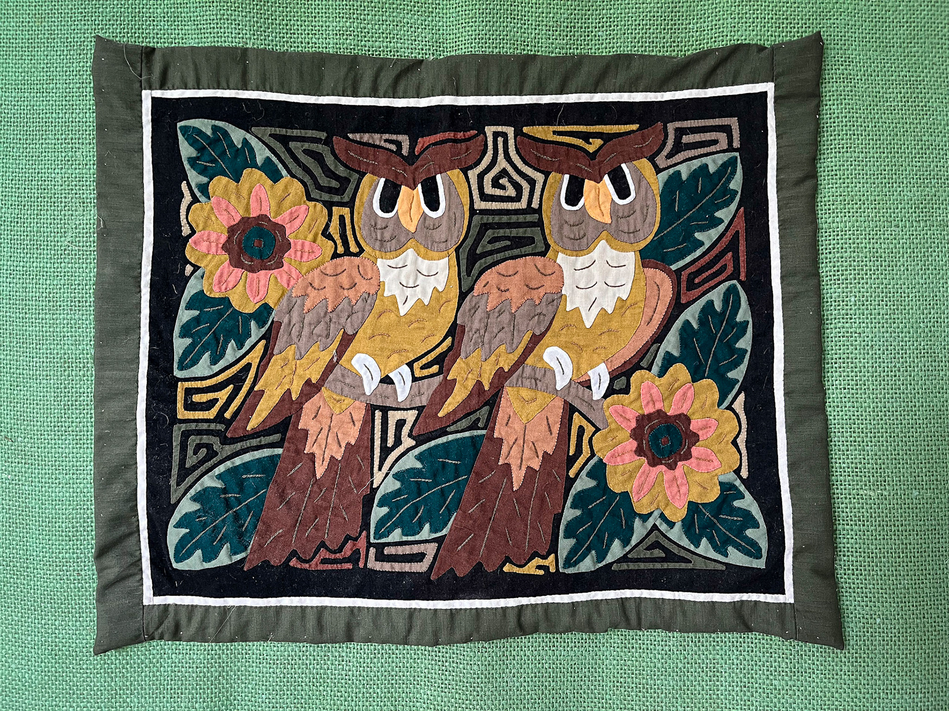 Mola stichery is more commonly seen than "Panama" hats.