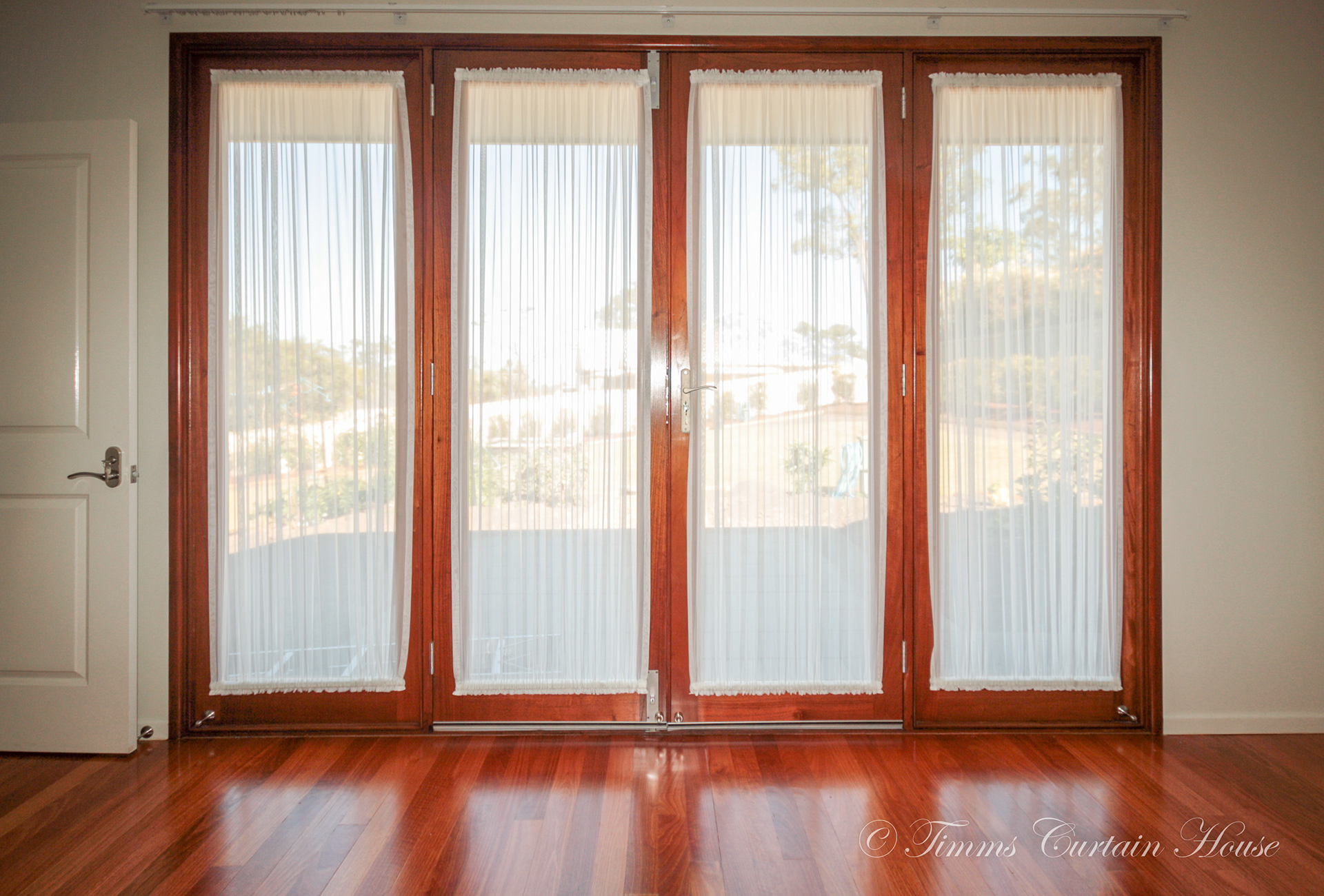 Sheers on wooden folding doors