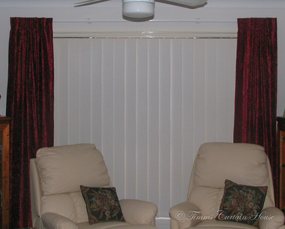 Blockout curtain over vertical blinds