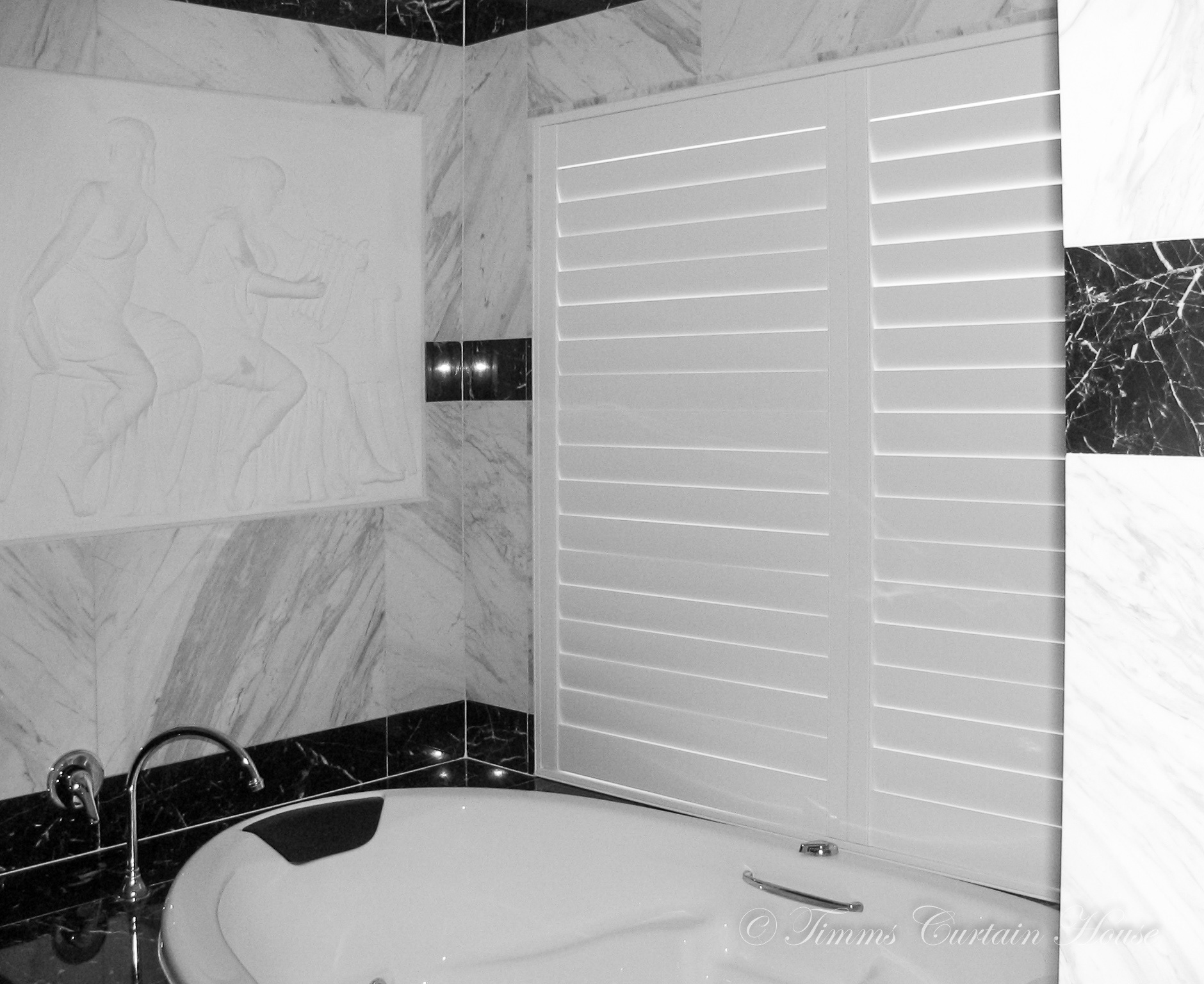 Shutters to edge of spa