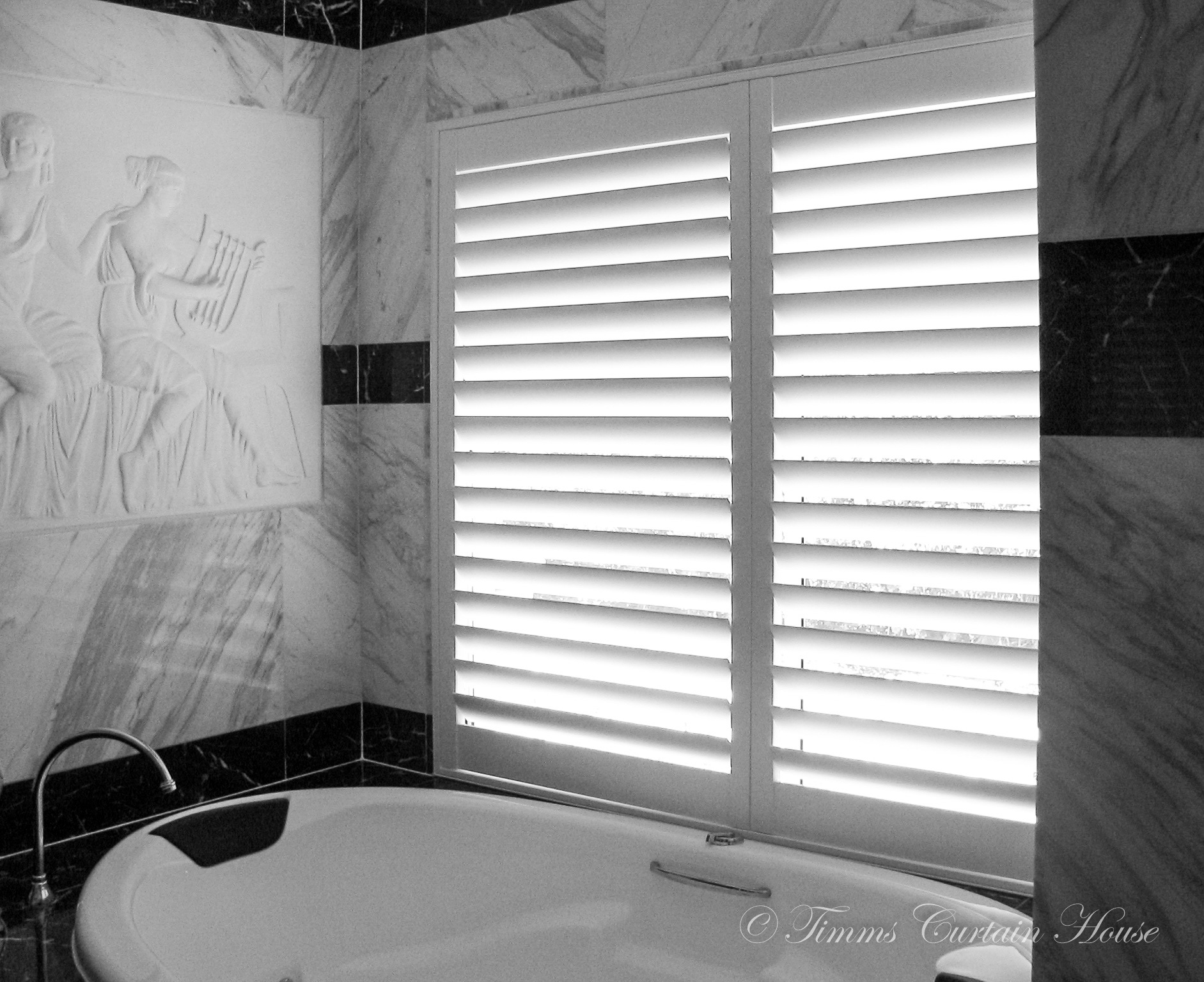 Shutters to edge of spa