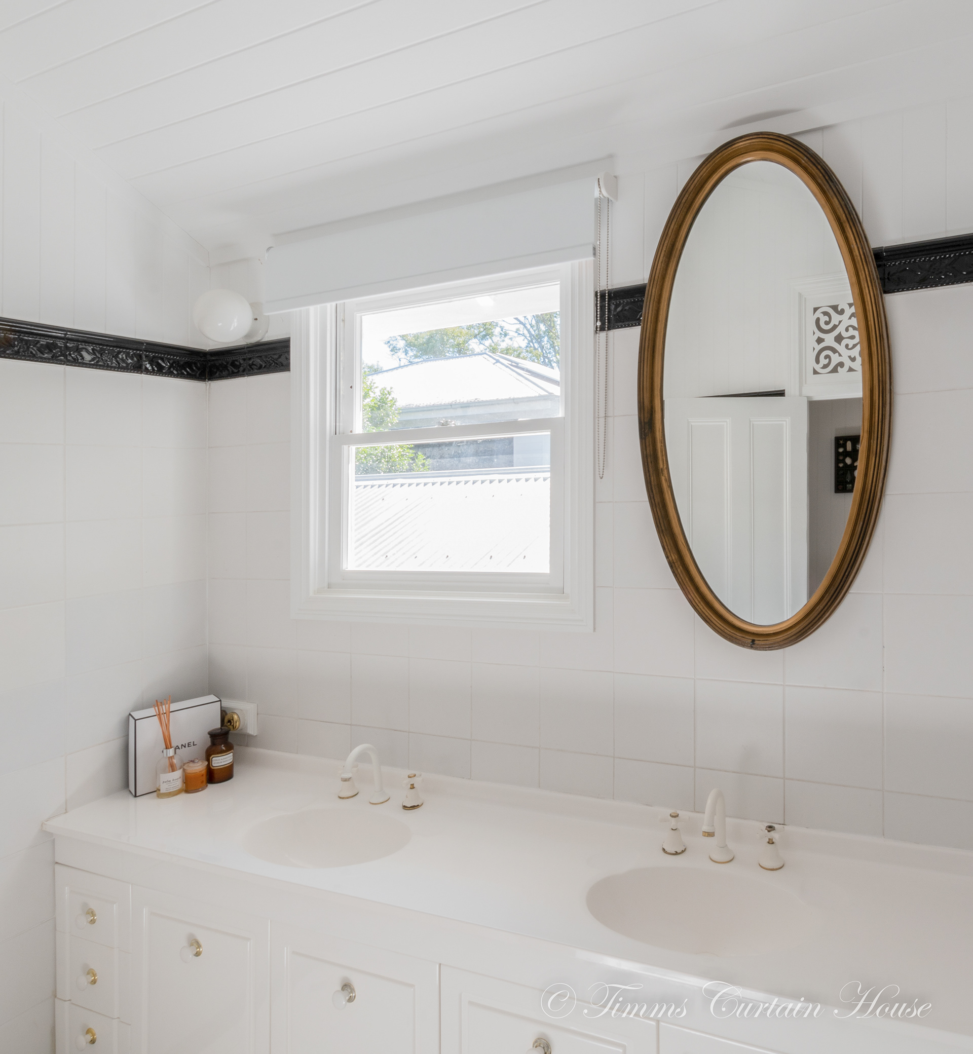 White roller blind in bathroom