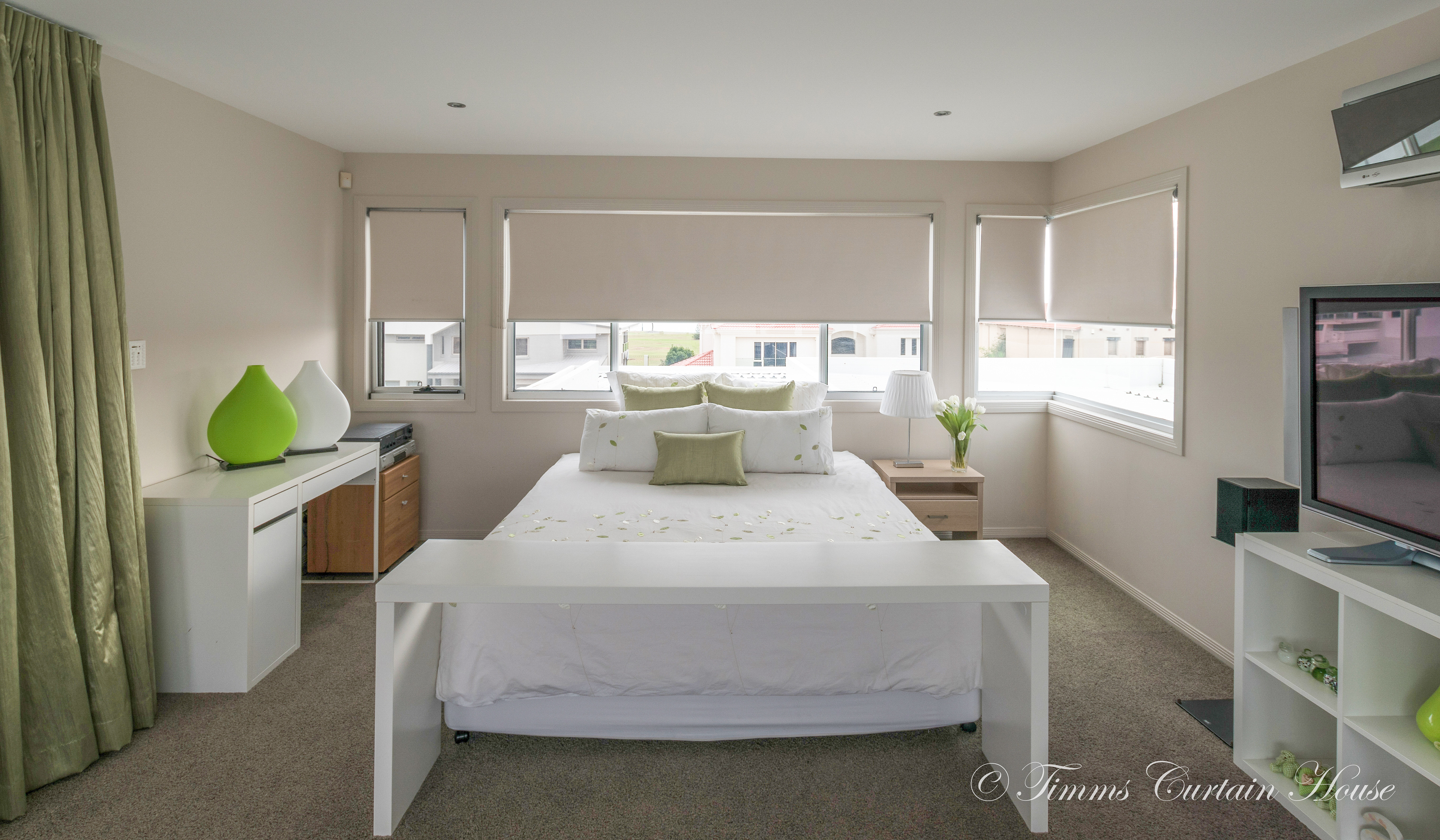 Floor to ceiling curtain paired with rollers