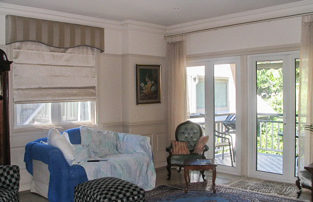 Pelmet over roman matched with sheer from pole