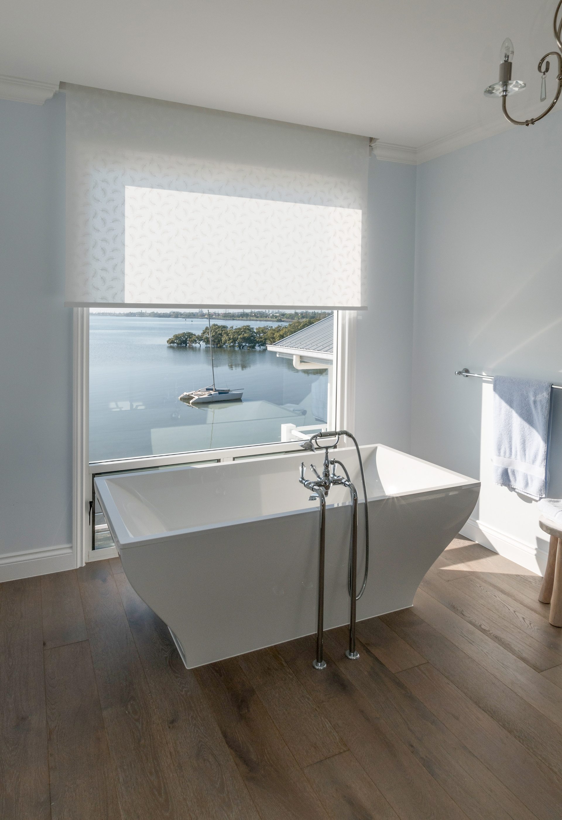 Motorised blind from recessed ceiling