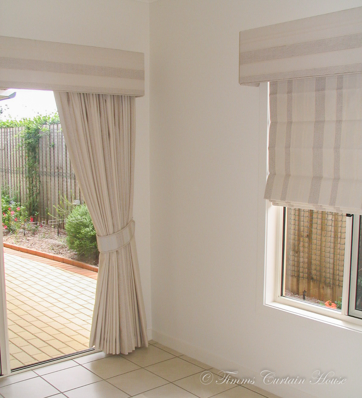 Pelmet over matching curtains and roman