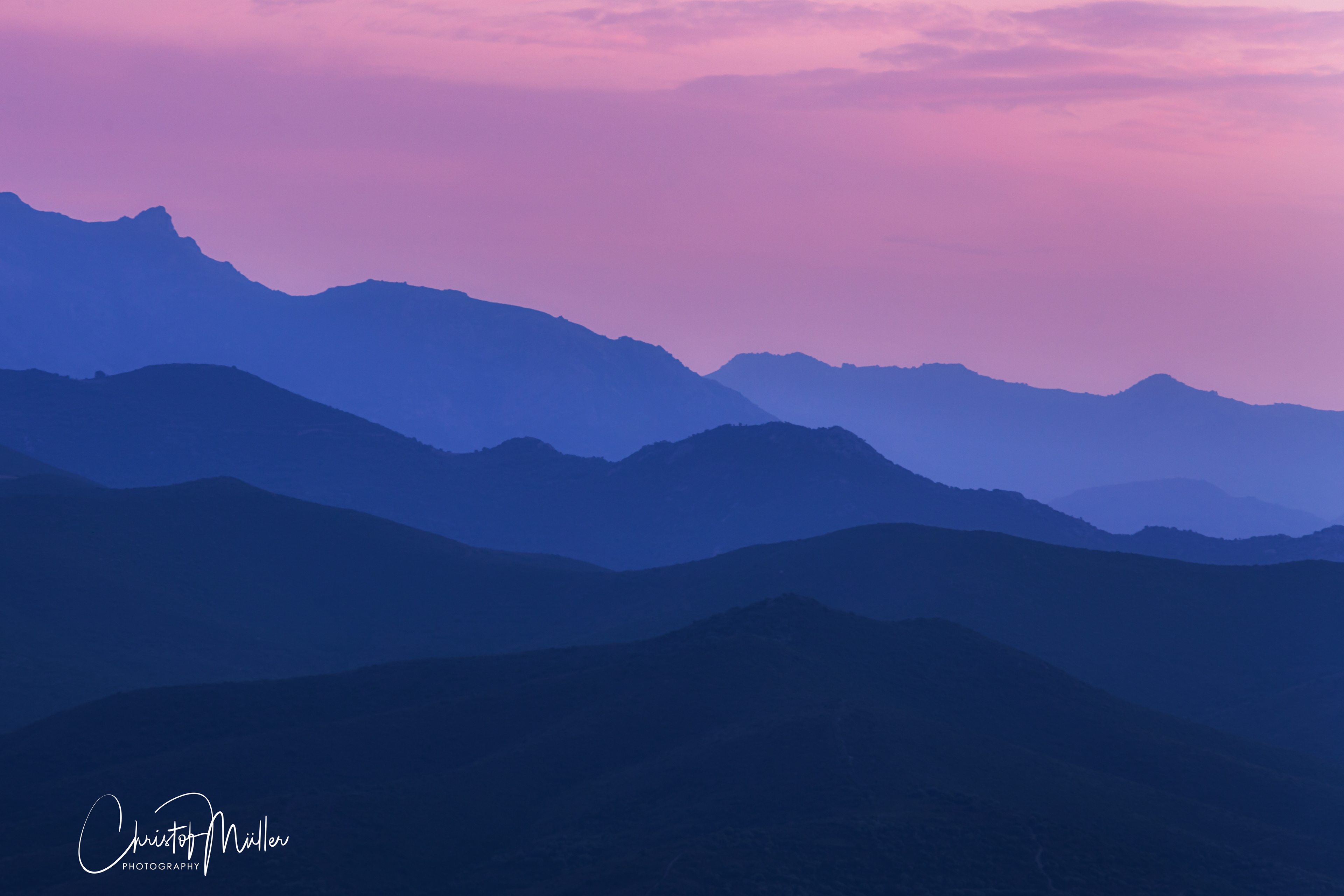 Cascade of Mountain Ridges during twilight in Corsica (2019)