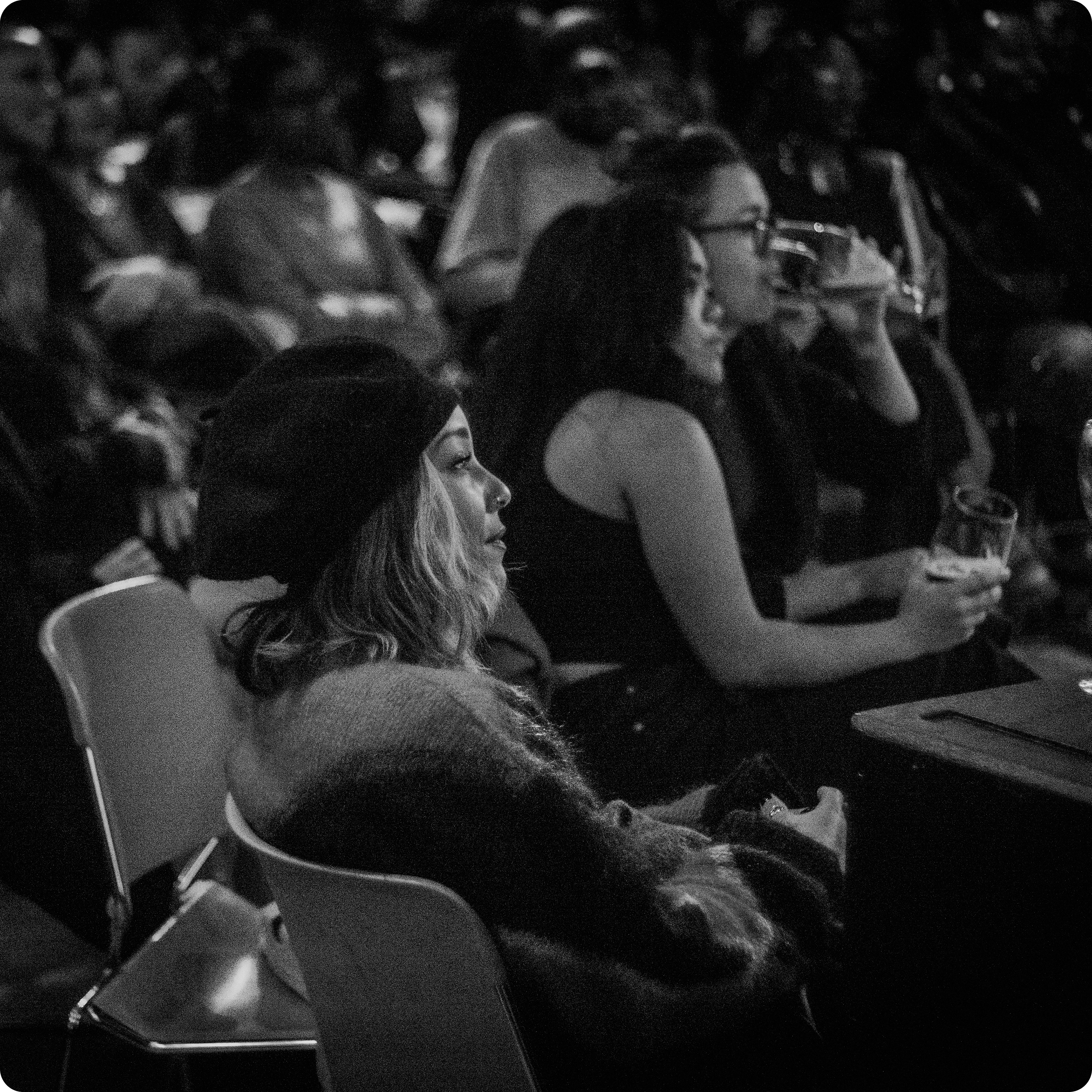 Audience members take in the sights and sounds at "Vulnerable" in Strange Brew, Bristol