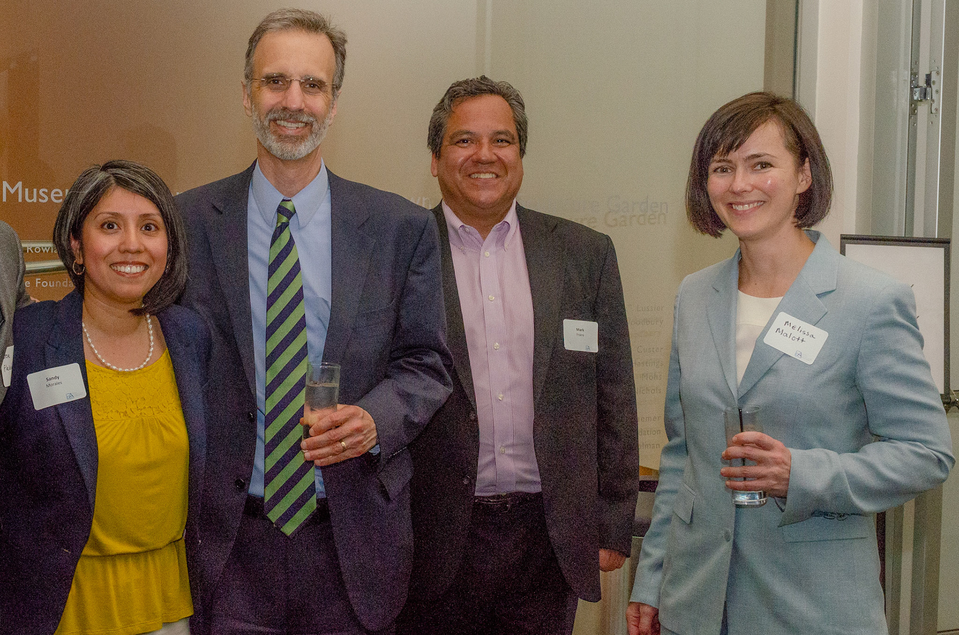 Event goers pause for a quick snapshot