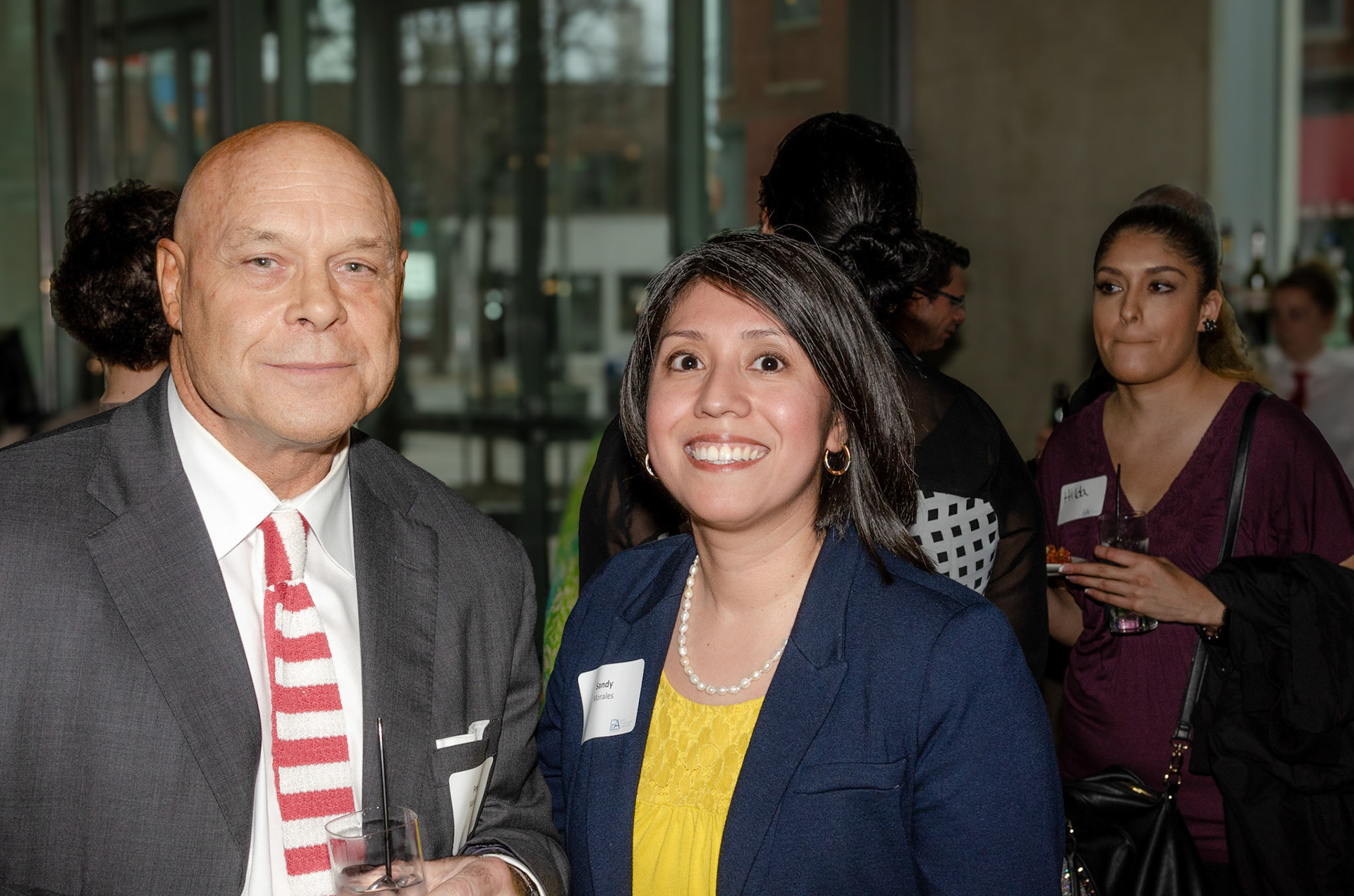 Event goers pause for a quick snapshot